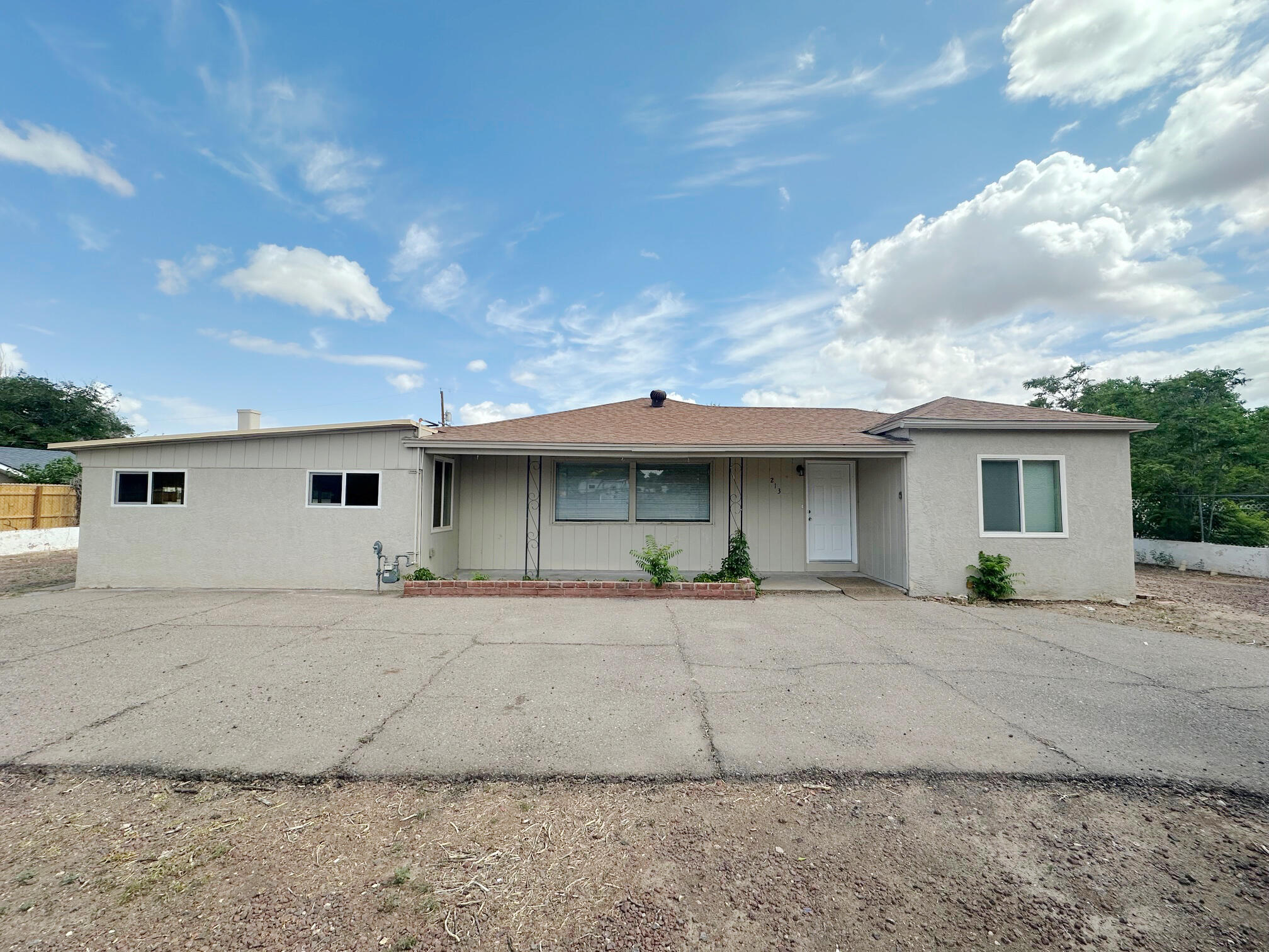 This Los Ranchos property is waiting for you to call it home. Located on a half-acre lot, there is plenty of room for your pets, a garden, and outdoor activities. Large carport and additional driveway parking plus backyard access. Two bedrooms and two baths as well as a good-sized additional room that could be a third bedroom or a sunroom. Several living areas offer flexible space for relaxing and entertaining. Come see this North Valley home today.