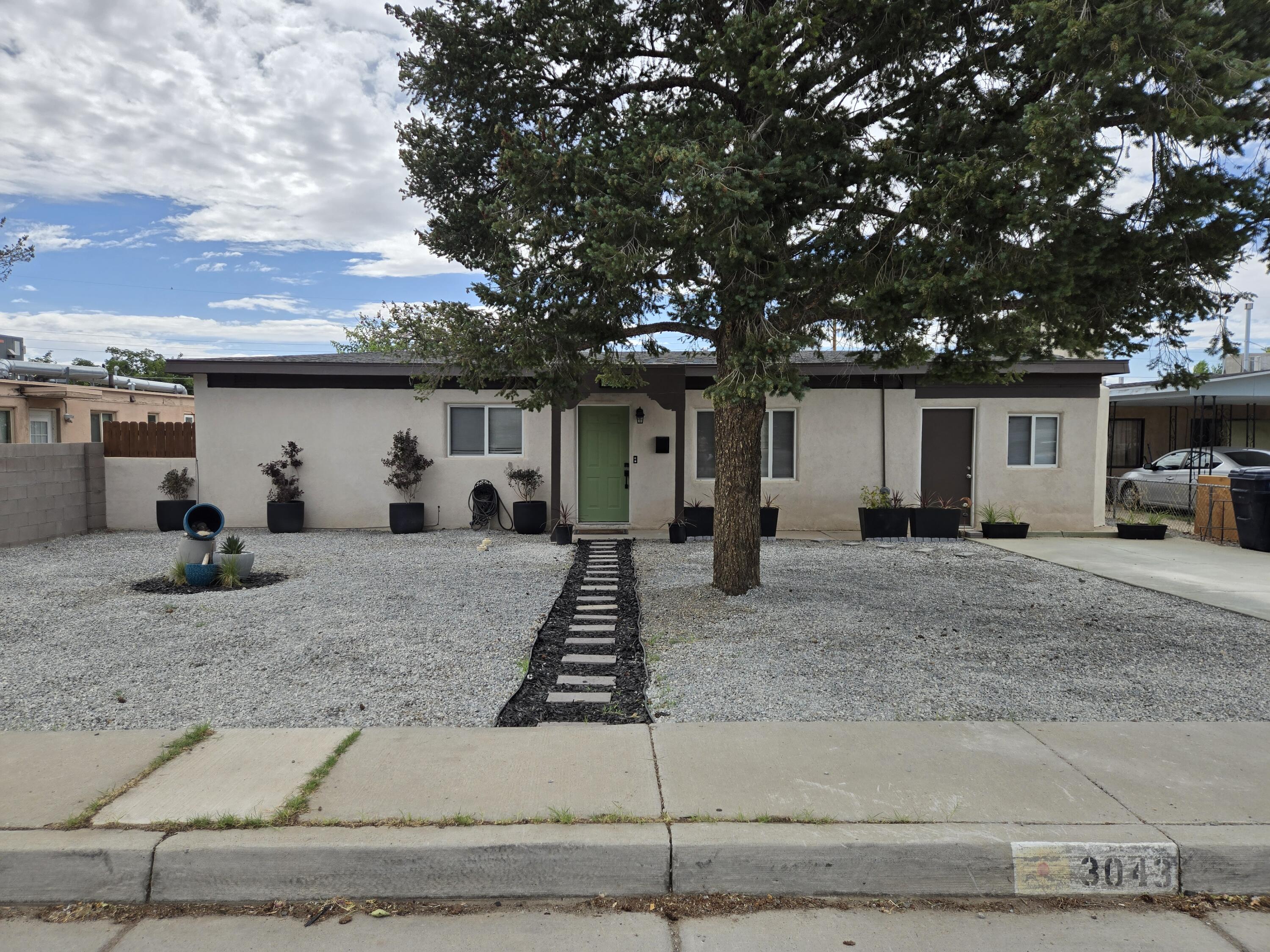 A rare treat in the Bel Air Subdivision! Centrally located in the heart of NE ABQ, easy access to everything. 4/2, 3 living spaces, recently refreshed! Refrigerated air combo unit, pitched roof, double pane windows. Come see this cutie! Walk in to a spacious living rm w/ laminate flooring that opens to a bonus living space w/ a wood burning FP. Kitchen is attractive, access on both sides. Flows into another bonus space could be an office, dining, flex rm. Primary is off the kitchen w/ a huge walk in closet. Past the kitchen is the 3/4 bath, laundry area w/ storage, large pantry. Down the hall is the full bath & 3 spare bedrms. Yards are landscaped! Low maintenance, healthy trees. Backyard has grass, gazebo with an new cover, patio furn included. Shed is clean, block walls, Pets will LOVE!