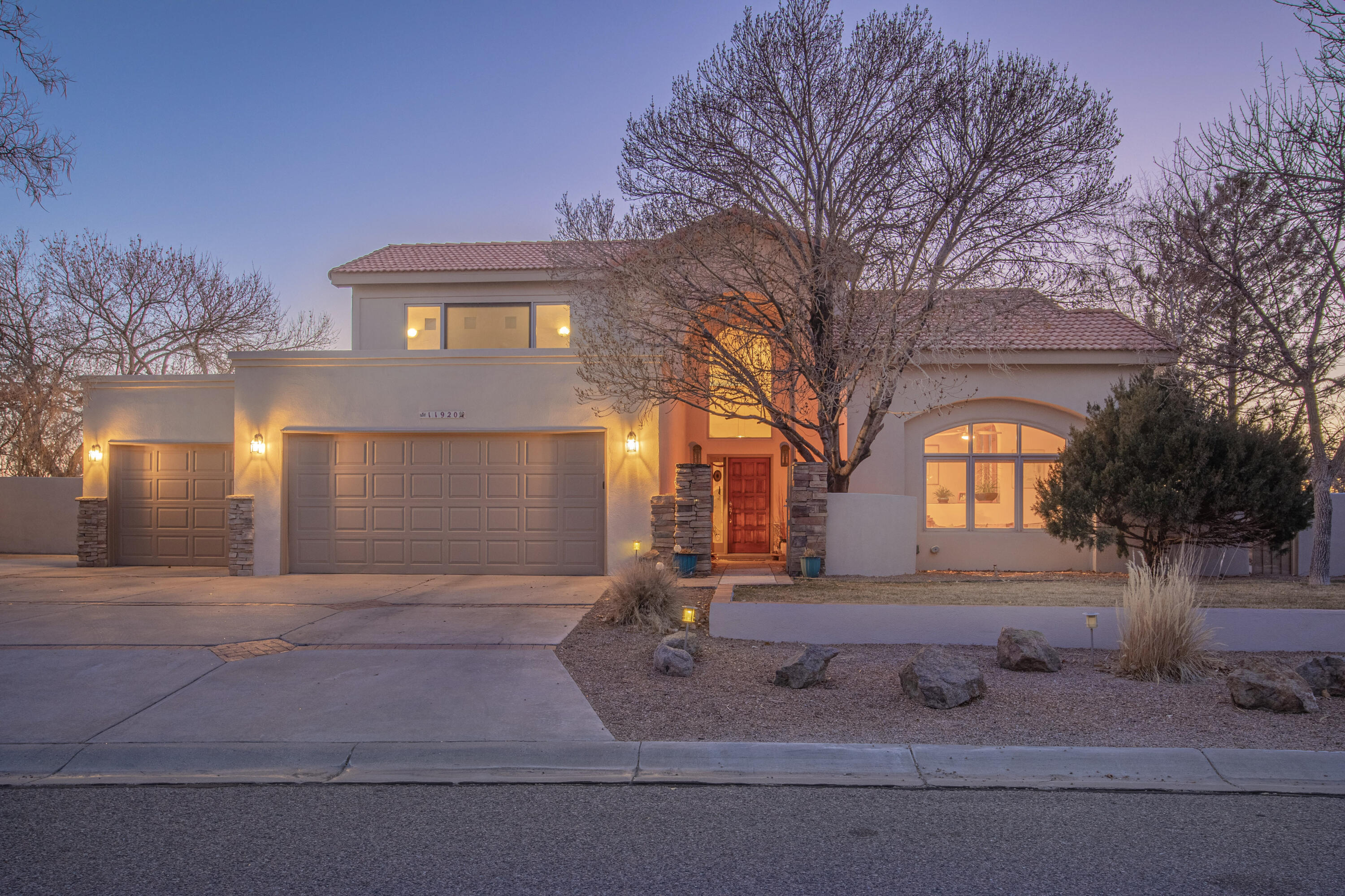 Fantastic views of BOTH the mountains and city lights!  Private spacious backyard for play and relaxation.  Artist renderings on the wall for simple bliss and escape. Entire wing of home was designed to be handicapped accessible, and includes a roll-in shower, a Murphy bed and kitchenette.  Three living areas, one could be an in-law area, a separate spot for the kids, or a second master on the first floor.  Fabulous private master suite including a steam shower, jetted tub, fireplace, and balcony for the stars PLUS a bonus office, nursery, or exercise room. No carpet, just tile and slate.  Black granite countertops, custom maple cabinets, stainless appliances, two ovens, 6 burner range in the kitchen. Easy re-lock Lincoln windows, TPO and tile roof, still under warranty, Original owner