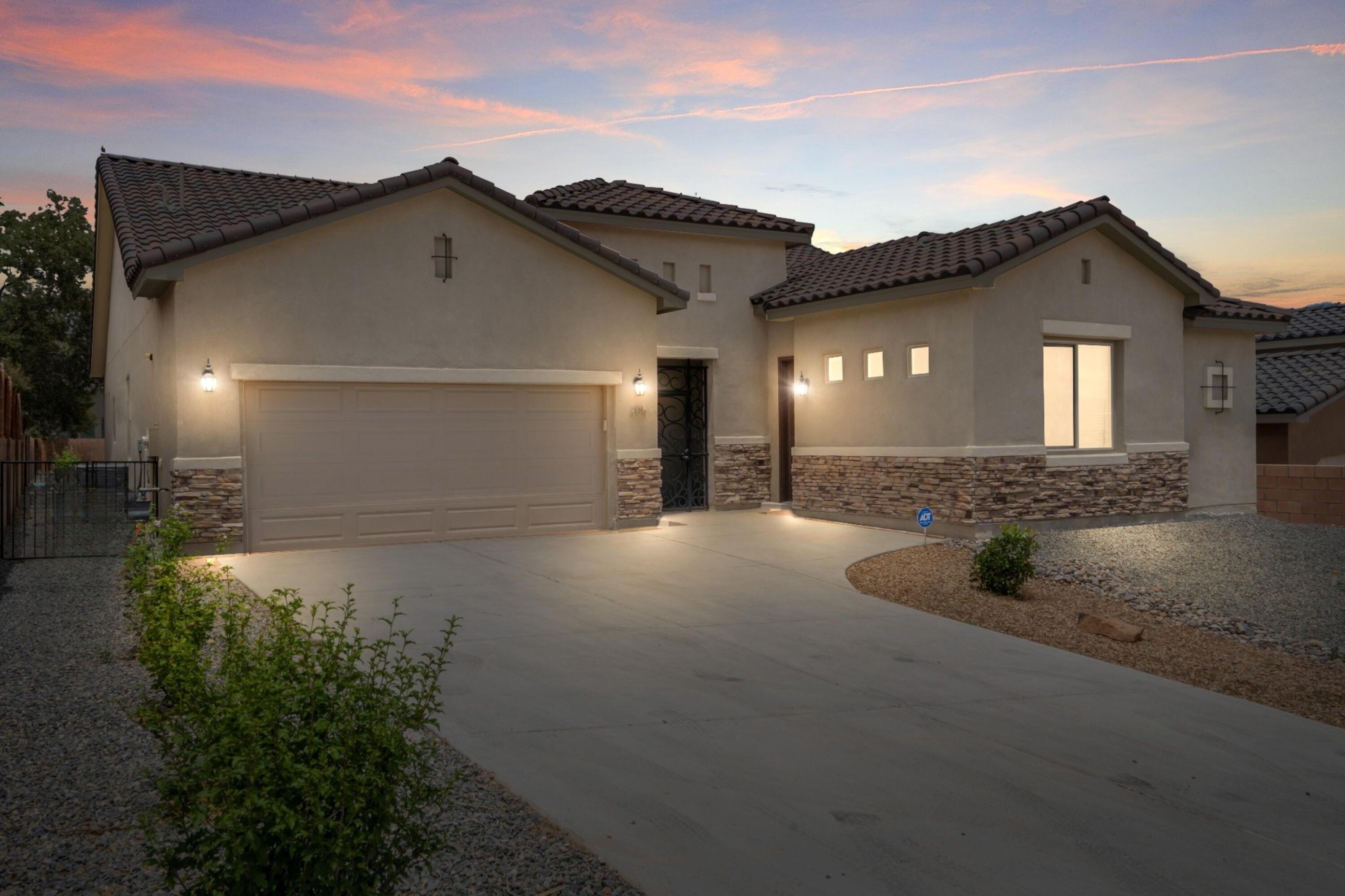 Welcome to your dream home! This beautiful three year old home offers an open layout perfect for entertaining and multi-generational living. The phenomenal kitchen is a chef's delight, with a S/S gas cooktop, built-in microwave, oven, D/W, a Samsung bespoke refrigerator and a great walk-in pantry. The thoughtful design also has a convenient in-law suite or home office. It provides flexibility for guests or extended family with a separate entrance, a living area, kitchenette and full bath. Enjoy comfortable living with plush carpet in the bedrooms and stylish tile in the main living areas. Retreat to the spacious primary bedroom featuring a gorgeous full bath and a generous walk-in closet. Unwind in your private backyard oasis, complete with a relaxing hot tub and a versatile ''she shed''.