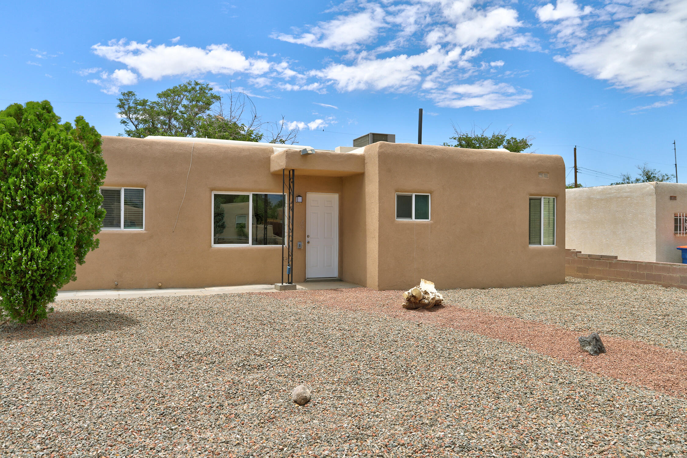 This charming 2-bedroom home with potential for a 2nd dwelling blends modern updates with everyday comfort. Enjoy a brand-new TPO roof, efficient refrigerated air, and a spacious backyard--perfect for relaxing, entertaining, or adding a garden. With alley access and a generously sized lot, there's also great potential for an ADU (Accessory Dwelling Unit) which seller is in the process of obtaining. Plumbing and electrical already there. Recently remodeled with stylish finishes--just bring your furniture and settle right in! A great opportunity for first-time buyers, investors, or anyone looking for a turnkey property.