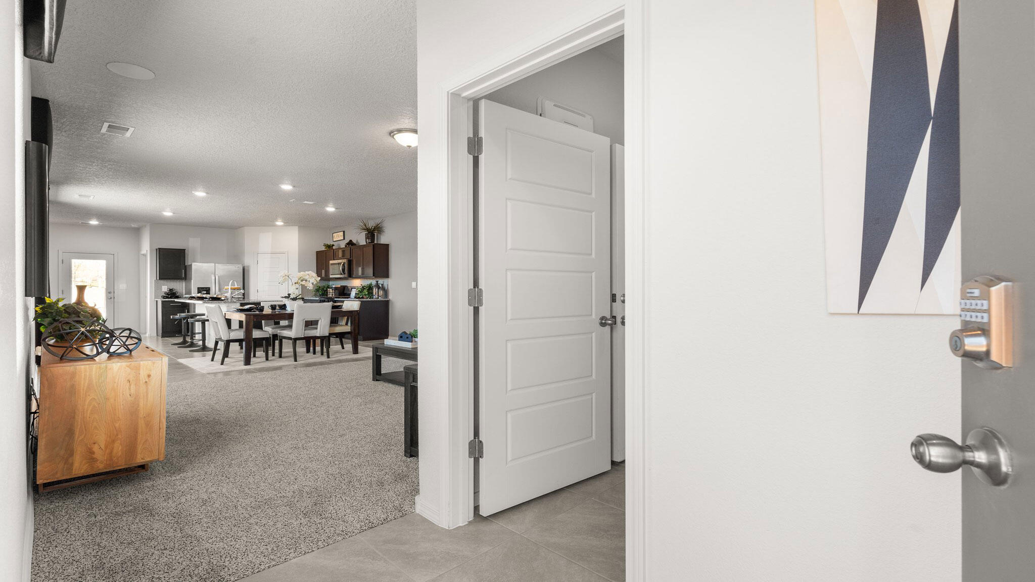 Modern comfort meets smart living in a gated community! Welcome to the Sawyer, a beautifully designed 4 bedroom 2 bath home in a secure, gated community. The open concept creates seamless flow between the living, dining and kitchen areas-perfect for entertaining or everyday living. Granite counter tops and backsplash tile in all kitchens is a must and standard here. The oversized primary bedroom is a true retreat, offering ample space for relaxation, a walk in closet and en-suite bath. Smart home features enhance convenience, allowing you to control lighting, security and temperature with ease. Ask about our amazing incentives and how you can save money!!