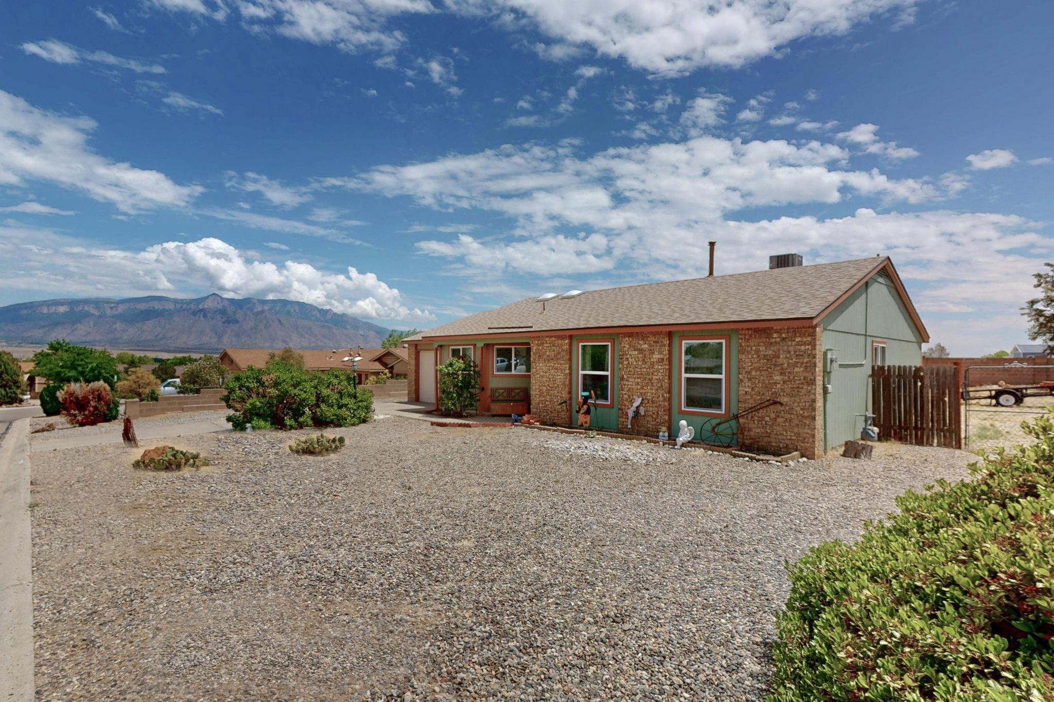 Charming and move-in ready, this 3-bed, 2-bath home in River's Edge offers fresh interior paint, updated appliances, newer roof, and multiple mechanical upgrades. Just over 1,200 sq ft, the home features a functional layout filled with natural light. Step outside to an oversized backyard with endless potential and stunning Sandia Mountain views--perfect for relaxing or entertaining. Located near parks and the Rio Grande Bosque, you'll enjoy easy access to trails, nature, and quiet surroundings. This lovingly maintained home is ideal for first-time buyers, downsizers, or anyone looking for comfort and convenience.  Come take a look!