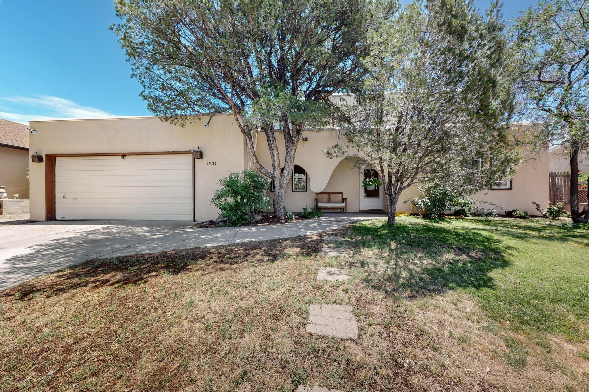 Welcome to this spacious two-story home in Albuquerque's desirable Northeast Heights! This beautiful home offers 5 generously sized bedrooms plus a possible 6th. Enjoy the flexibility of two living areas, perfect for relaxing or entertaining. The large backyard features mature fruit trees, lush grapevines, and ample space to garden or entertain. The home boasts a newer water heater and HVAC system, as well as a reverse osmosis water system. Set in a lovely, established neighborhood, this delightful home offers a perfect blend of comfort, character, and room to grow.