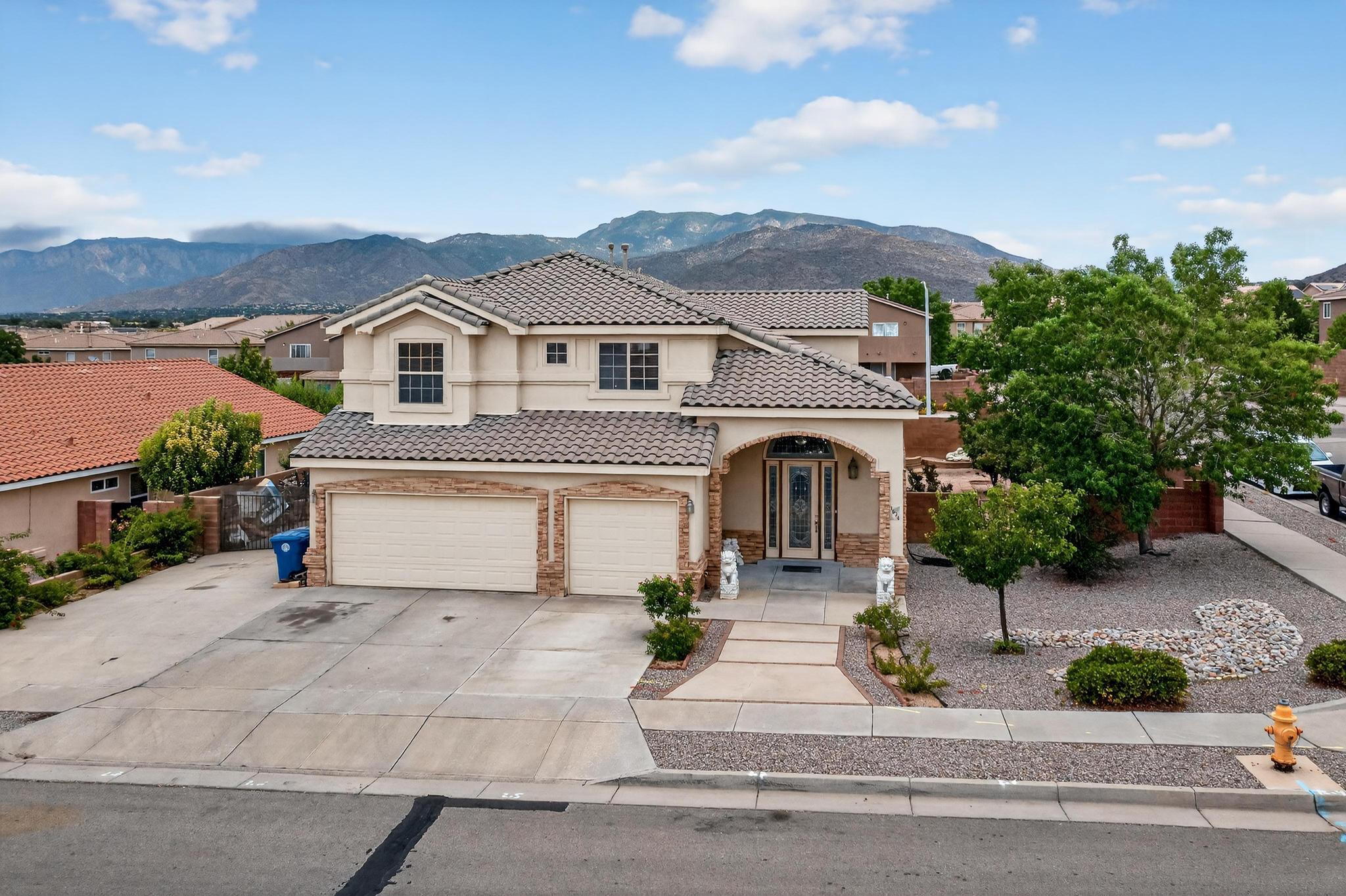 Welcome to this lovely and spacious home in the serene Juan Tabo Hills! Tucked away in a quiet and private neighborhood, this bright and inviting 4-bedroom, 3-bathroom residence offers the perfect blend of comfort, functionality, and style. Enjoy two generous living areas--ideal for both relaxation and entertaining.The primary suite features a large walk-in closet and a private balcony, creating your own peaceful retreat. Additional highlights include a 3-car garage and a side gate with ample space for boat or trailer parking.Best of all--no PID fee!