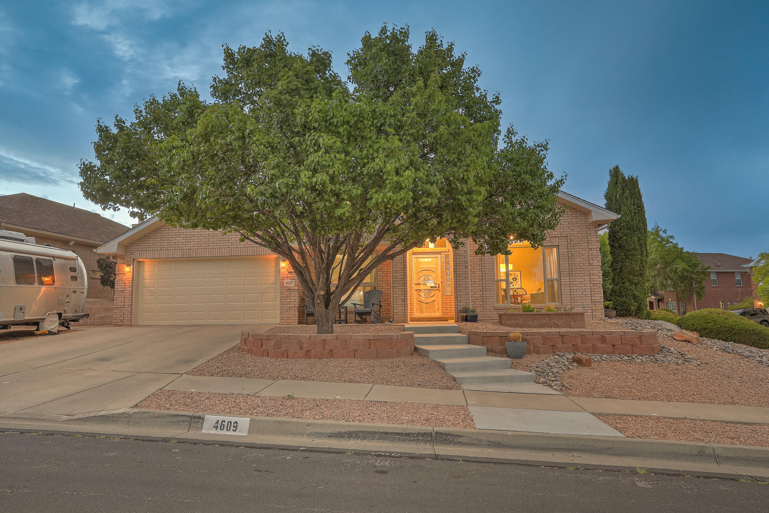 Don't miss this Wonderful, updated Opel Jenkins Home. Newly painted Single story Brick home on a corner lot on a cul-de-sac. This home has 4 bedrooms and an office. The bedrooms have separate wings which make it great for multi-generational living.  Upgrades & Architectural details: Sculptured Ceilings, Breakfast Nook, 2 living areas. Fireplace & Electric Fireplace, All New Flooring-Tile & Carpet, New Windows & Mastercool. Large Patio Cover w/ superb landscaping Back and Front, New Front Walkway, New Quarz Countertops w/ Tile Backsplash in Kitchen along w/ New Stainless-Steel Refrigerator, Dishwasher & Microwave. 2 Baths & Laundry have Quartz Countertops. This is an exquisite home. Don't miss out.