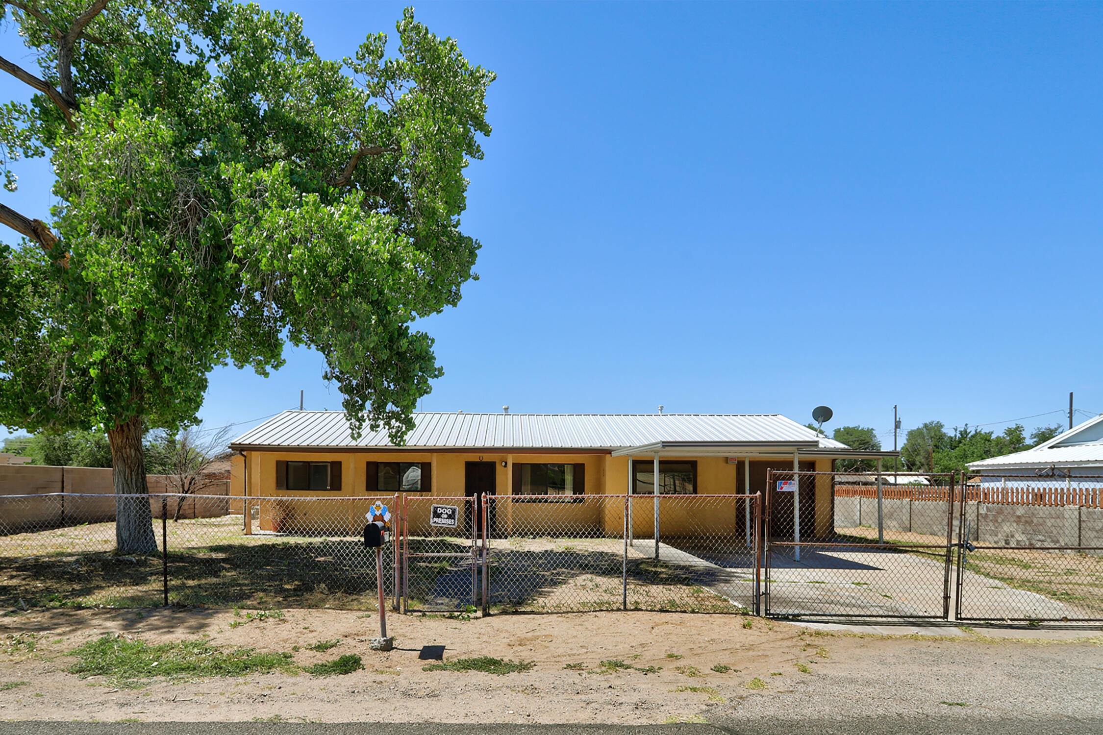 Amazing opportunity to own this wonderful South Valley home. Enjoy country while staying close to everything. This property features  4 bedrooms plus an office, 2 bathrooms, a utility hobby, a spacious den, and a family room. There is also a sunroom perfect for plants and garden enthusiasts. Additionally, the property includes a separate 3-car garage with an oversized RV bay and a loft. With so much potential, this home is ideal for hobbyists or those running a home contractor business. The property is an estate and is being sold as-is. Needs a little TLC but has a amazing upside oppertunity. Priced well below market.