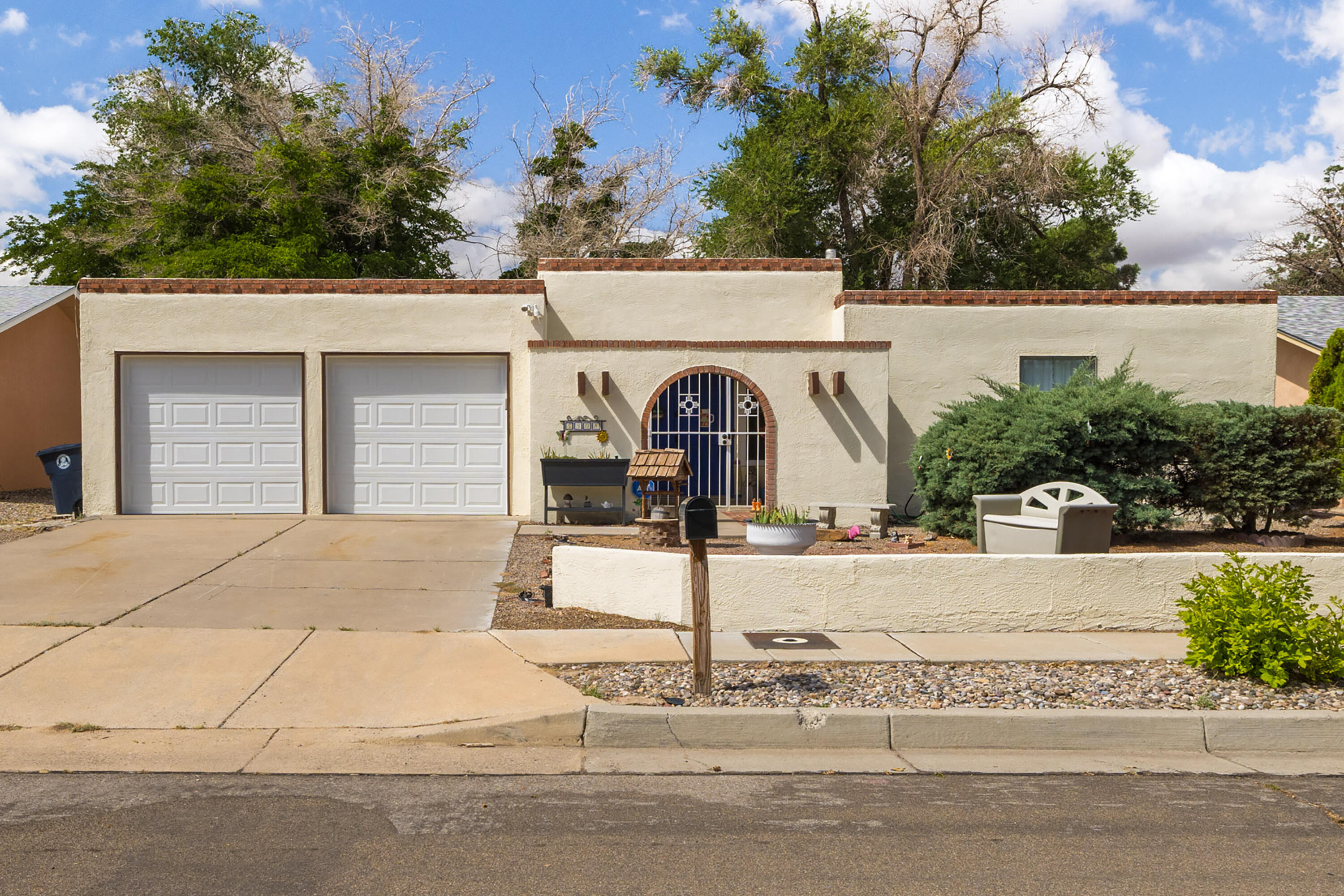 This home is calling your name to make it yours. Wonderful floorplan with open living room with bedrooms on the west side and kitchen/dining on the east.  Owner just put a new garage door on this property and recently had the roof serviced and new canales were installed 12/24.  Primary bedroom has 3/4 bath.  Easy access to shopping and schools.