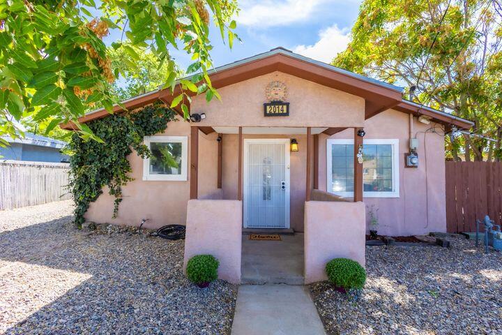 Discover comfort and convenience in this thoughtfully updated home. Enjoy backyard access to a spacious covered patio, complete with a workshop and ample storage. Relax under the gazebo by the outdoor fireplace, tend to your own chicken coop, or harvest apples from the flourishing garden area. This backyard oasis is ideal for entertaining guests or simply unwinding in your private retreat. The fully fenced and beautifully landscaped front yard enhances both privacy and curb appeal. Located just minutes from shopping, dining, and freeway access, this home offers seamless connectivity to everything the city has to offer. Don't miss your chance to  experience this inviting home--schedule your tour today!