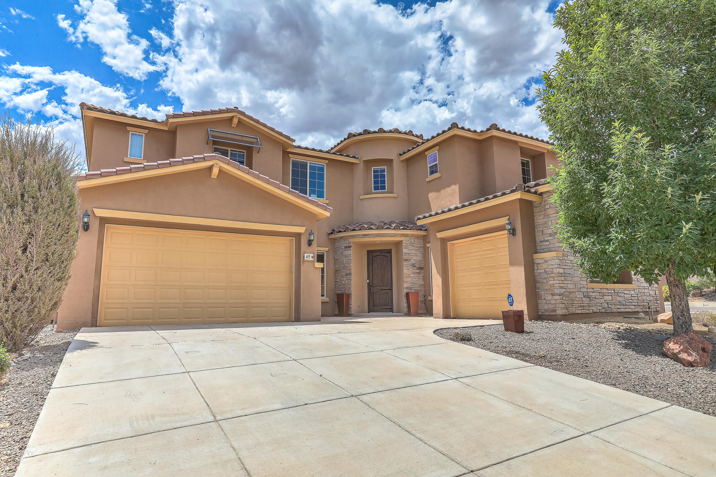 Stunning 6-bedroom Loma Colorado home on a corner lot.  Upon arrival you will notice the large lot, two-toned synthetic stucco, and two separate garages with 4 total spaces.  Once inside, enjoy vaulted 20 ft ceilings, large open kitchen, 2 living spaces, huge 3-paneled sliding door, & guest bedroom with ensuite bathroom.  Ten-foot ceilings and extra tall 8ft doorways.  The kitchen features abundant cabinet space, and island that can seat 6, large pantry, granite countertops, and butler's pantry.  Upstairs features a large loft, XL primary bedroom with private balcony, his and her closets, a third bedroom with ensuite bathroom, and upstairs laundry room.Relax in the barefoot backyard thanks to a large, covered patio, synthetic grass, concrete basketball pad, and flagstone fire pit area.