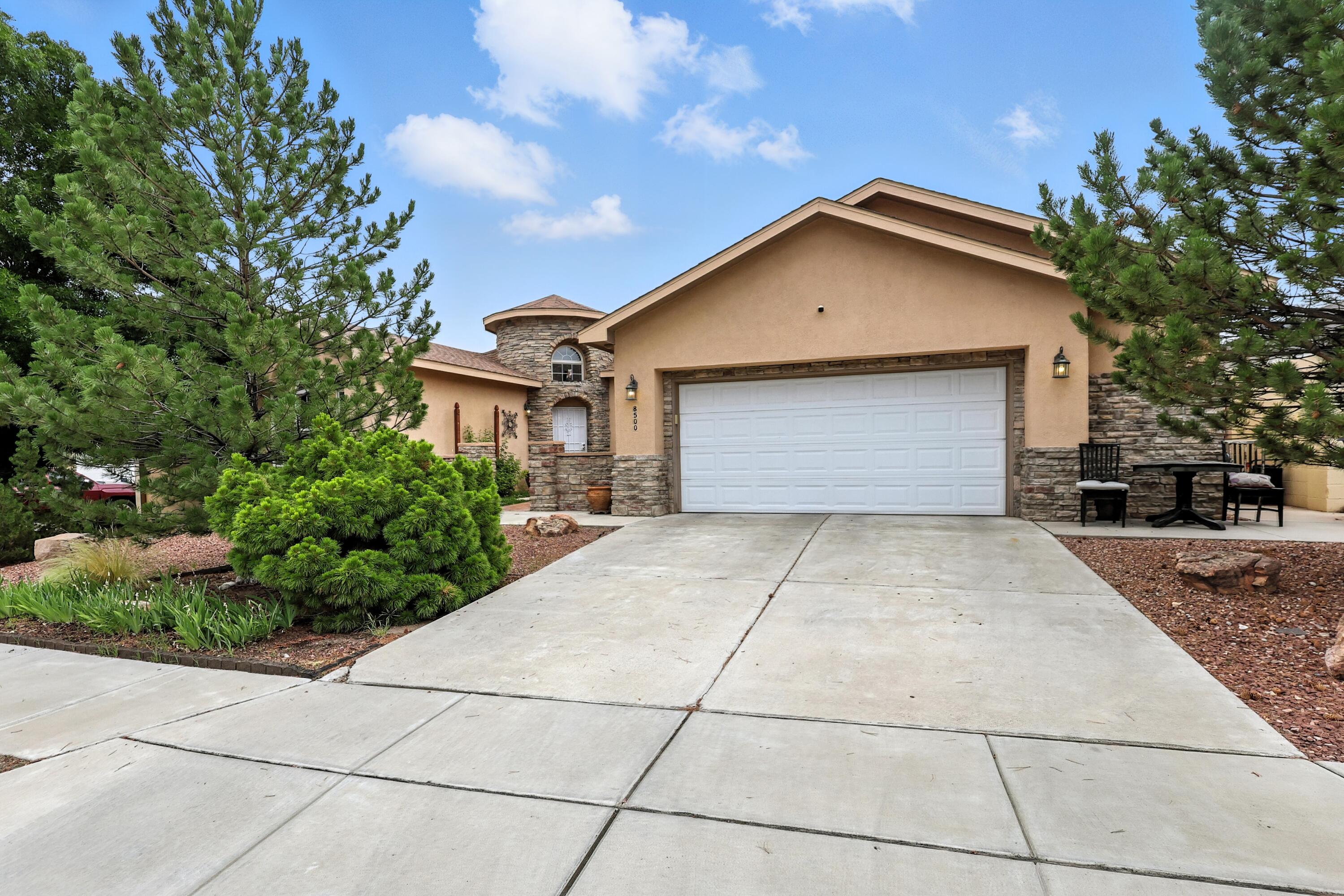 Beautiful single-level custom Fuller home on a corner lot with lush landscaping, covered patios, koi pond, and waterfall. Features tile floors throughout main areas, granite countertops, stainless steel appliances, wood plantation shutters, and upgraded lighting. Spacious split floor plan with private primary suite, jetted tub, and decorative touches. Guest suite with full bath, oversized finished garage with storage/workshop, and refrigerated air. HVAC upgraded 3 years ago. A true gem on a spacious corner lot!