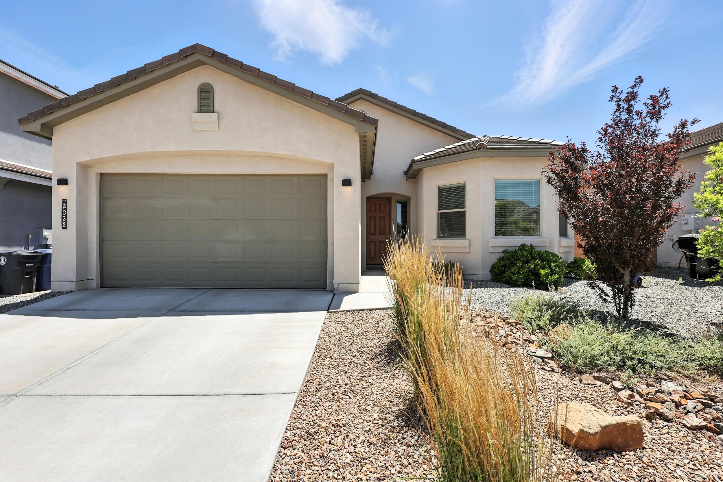 This four year old Twilight home in the highly sought after Volterra subdivision is waiting for new owners. The Verano floorpan offers an open feel with high ceilings and lots of natural light. Enjoy the chef's kitchen with a large built in gas range and granite countertops. The primary bath features a walk in shower, his/her sinks and a large walk in closet. The backyard offers plenty of space and a large turf area that is easy to maintenance. Excellent location close to Kirtland AFB, Sandia Labs, the foothills and easy access to the freeway. Schedule your showing today before it is gone!