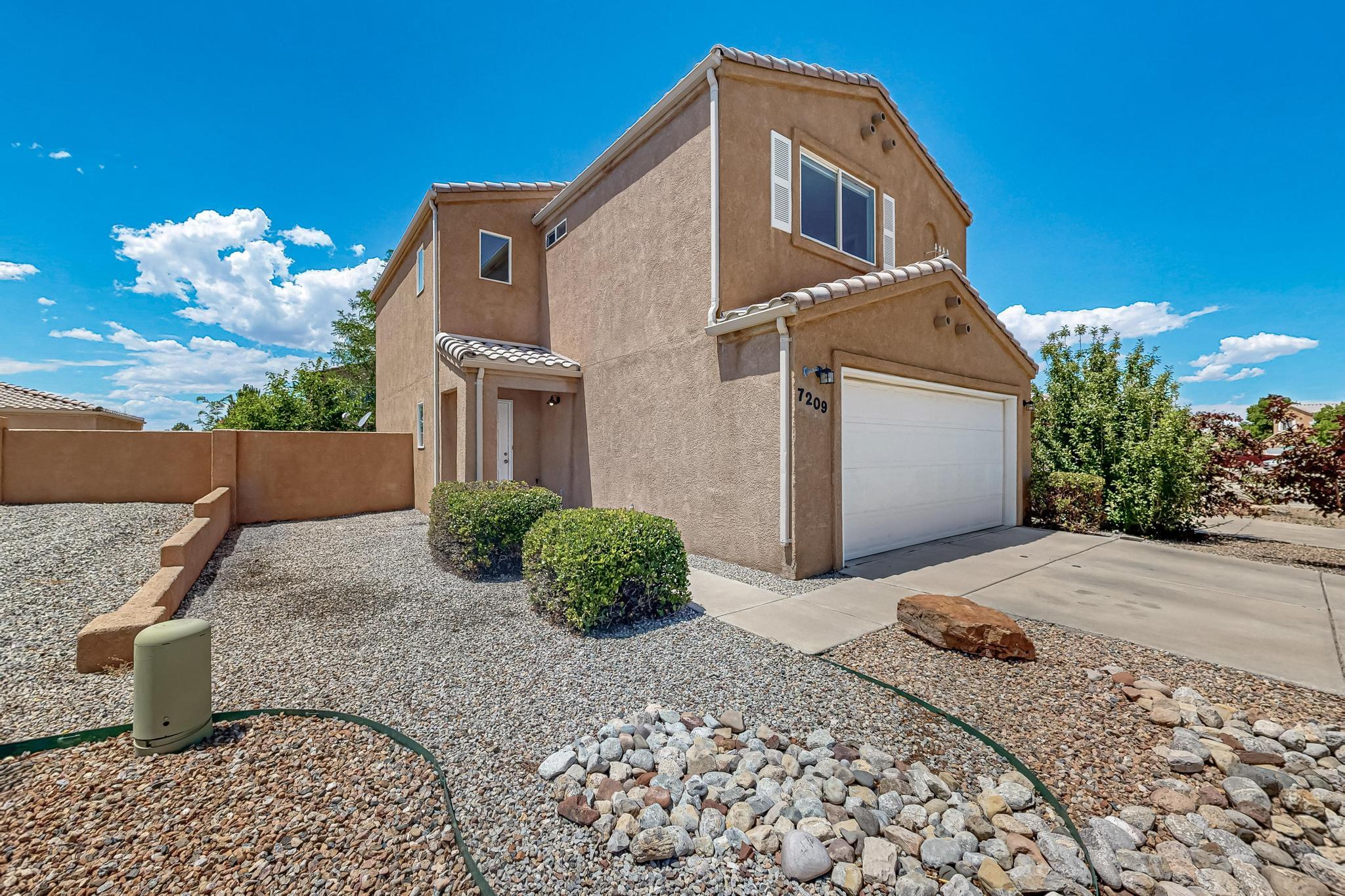 Welcome home! Excellent price on this 3 bedroom, 3 bath home in Vista del Norte. Generous great room downstairs, with a nicely updated, stainless and stone kitchen and plenty of room to entertain or simply stretch out and relax. Three bedrooms upstairs with two full baths and a half bath downstairs. Nice patio and easy-care landscaping in back. Don't sweat July, August and September, because the refrigerated air added a few years back will keep you cool no matter how long summer stretches. And hey - you'll be moments from Balloon Fiesta when things finally start to cool down in October. Lovely neighborhood with parks and bike trails, close to shopping, restaurants and an easy commute for work or recreation. Don't miss this one!