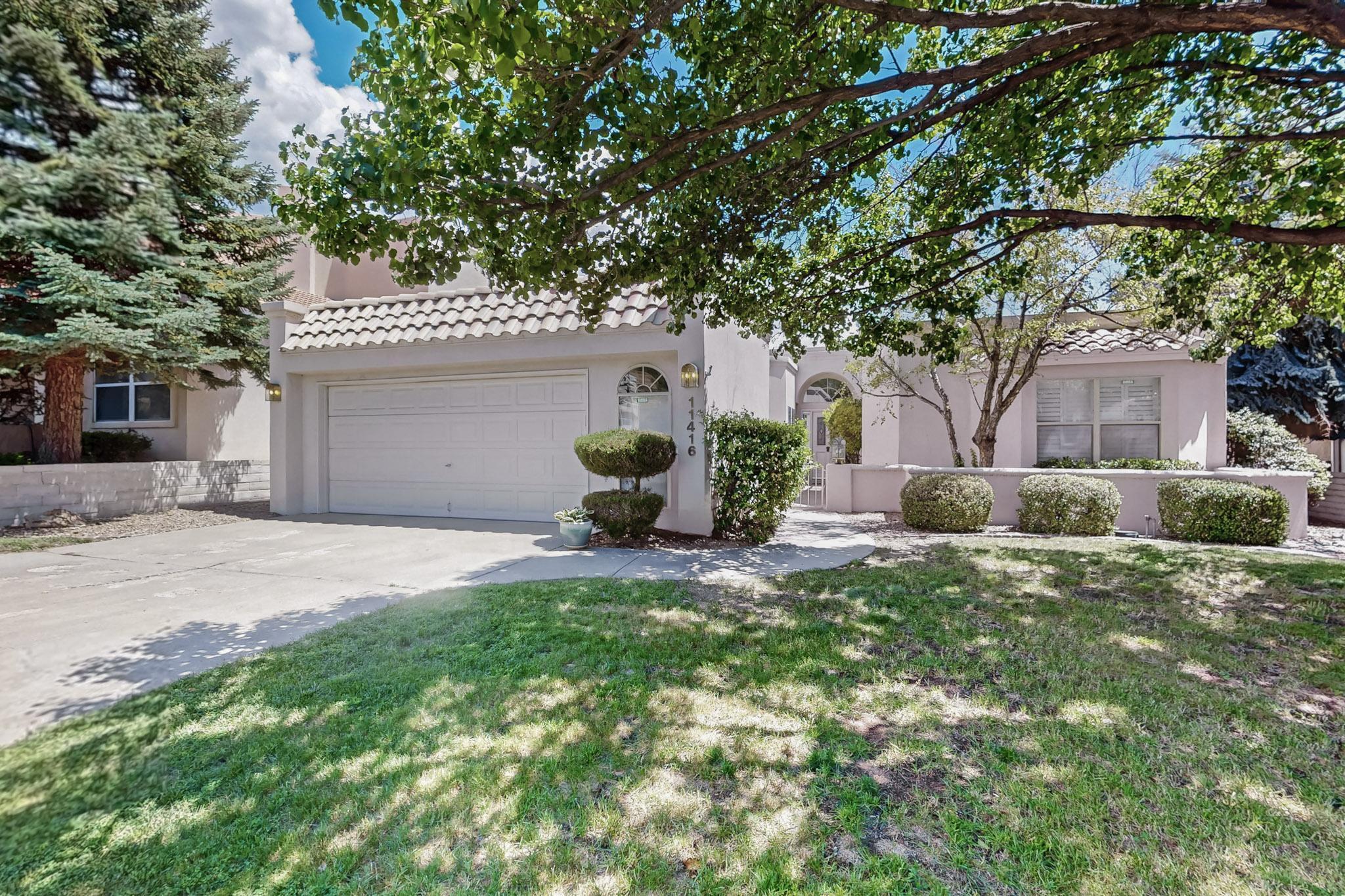 Lovely single story 2 Bedroom 1.75 Bath home in gated Tanoan Country Club! Enter through a charming courtyard into the open foyer/ main living area with wet bar and gas fireplace. Sunny kitchen features large island and opens to second living area. Spacious primary suite with walk-in closet, double sinks, walk-in shower and soaker tub. Oversized 2 car garage, fully landscaped front and backyard, top rated schools - Backs to golf course!