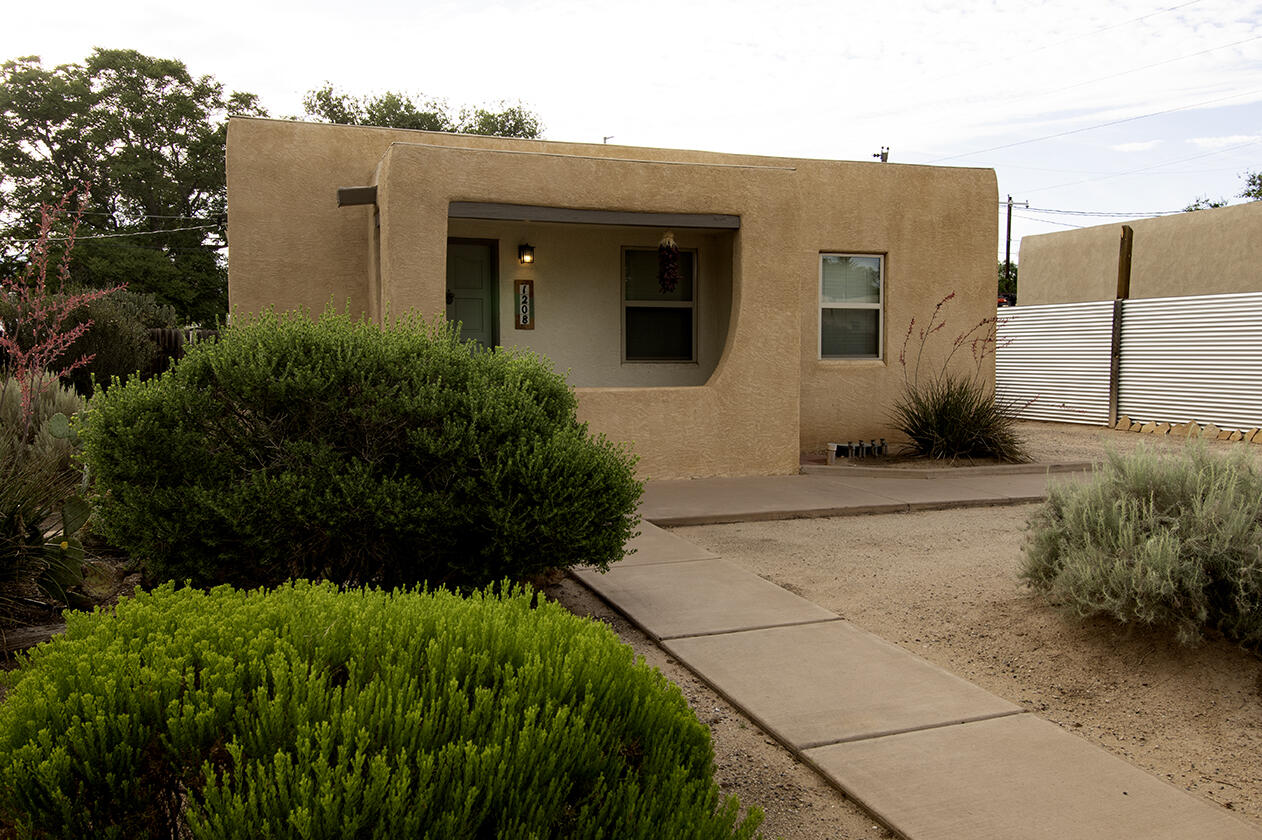 Amazing home nestled in the heart of north UNM neighborhood with .4 miles to UNM law school, .9m to UNMH with medical school, nursing school , pharmacy school,  and Ronald McDonald House all nearby. Hardwood floors, updated electrical service and plumbing, forced air heat and refrigerated AC, insulated windows and stucco on house and garage redone, TPO roof installed 2019, granite counter tops, tile floors in kitchen and bath and all appliances stay. There's a one car detached garage and metal security gate complete with storage shed in the beautifully landscaped backyard. Plenty of off street parking in the driveway and front and back yards. Move in and start enjoying this beautifully remodeled house! Welcome home to north UNM Lobo Addition neighborhood.