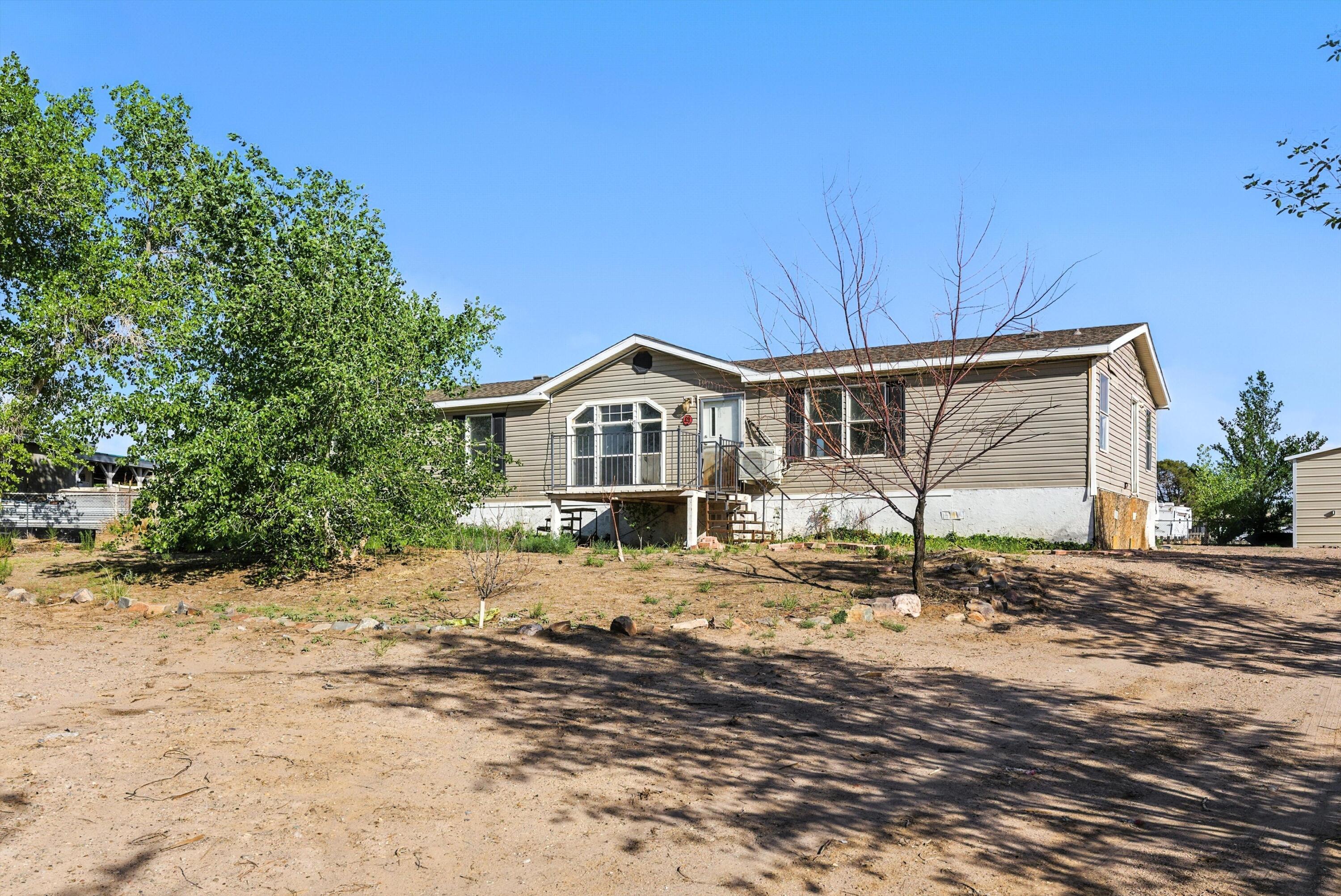 Charming home with lots of space! You can't miss this 5 bedroom 2 bath home on a half acre lot! This home has it all with a light and bright living area, and open concept kitchen with dining area. The primary bedroom offers a well sized bathroom and closet and 4 bedrooms and another full bath to follow! Outside has plenty of yard to make your own and open space for entertaining during the spring evenings. Lots of storage and room for everyone in this incredible property. Come see this today!