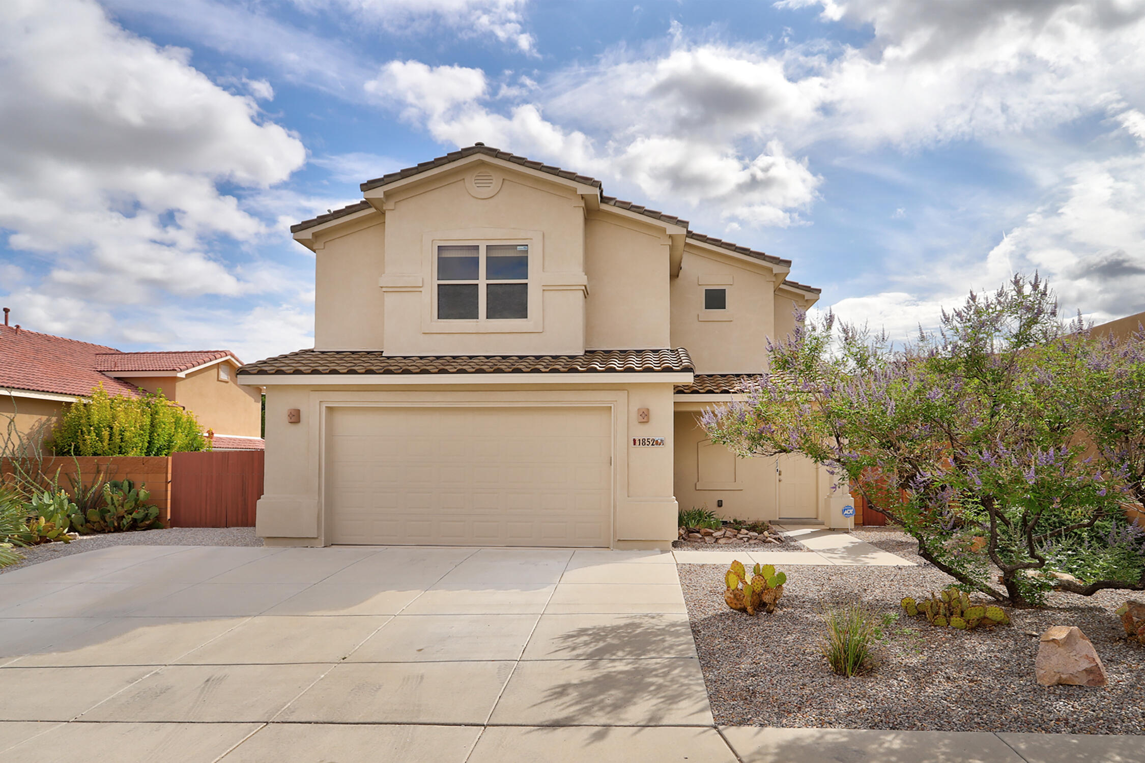 One Look will do for this great home with NO PID in Juan Tabo Hills.  2 living areas (1 up 1 down) Primary bedroom is on the main level.  Gourmet kitchen with 5x8 granite island makes cooking and entertaining a pleasure. Gas cooktop, microwave/convection double oven + plenty of cabinet space. Huge game room upstairs with vaulted ceiling perfect for watching your favorite sports on TV, room for a pool table or amazing play area. 2 large bedrooms upstairs.  This home is on one of the larger lots in the subdivision and provides backyard access through 8' wide gate, room to park 4 cars in the driveway.  Backyard features raised garden beds, fruit trees and custom block/concrete fire pit seating benches.  Too many extras to mention...........Come see this great home today!