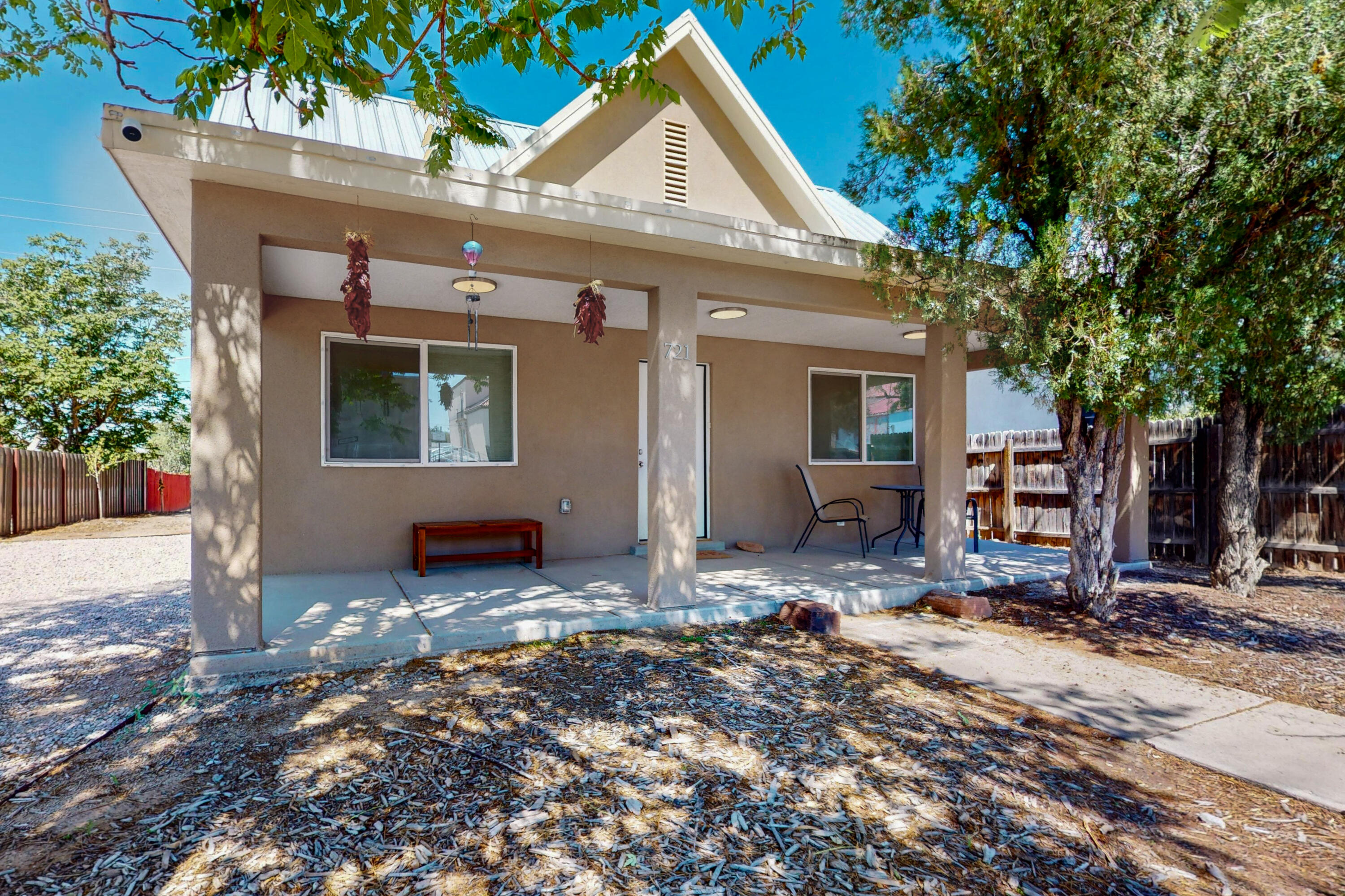 Newer construction home built 2021! This beautiful 3 bedroom 2 bath home in South Broadway/EDO district is not to be missed. Re-built from the ground up this one has newer everything! Refrigerated Air/ Heat combo unit. SOLAR Panels. Water softener system. Metal Roof. Plumbing. Beautiful open kitchen with granite counter tops, pantry space, tons of cabinets and counter space. Primary bedroom with walk-in closet, bathroom with granite counter top vanity and sleek tiled shower. Multiple off street parking options, driveway off of Edith for multiple vehicles and well as alley access for additional parking options. Across from Eugene Field elementary and close to The Rail Yards and minutes to Nob Hill, Downtown, Hospitals, freeway access and so much more!!