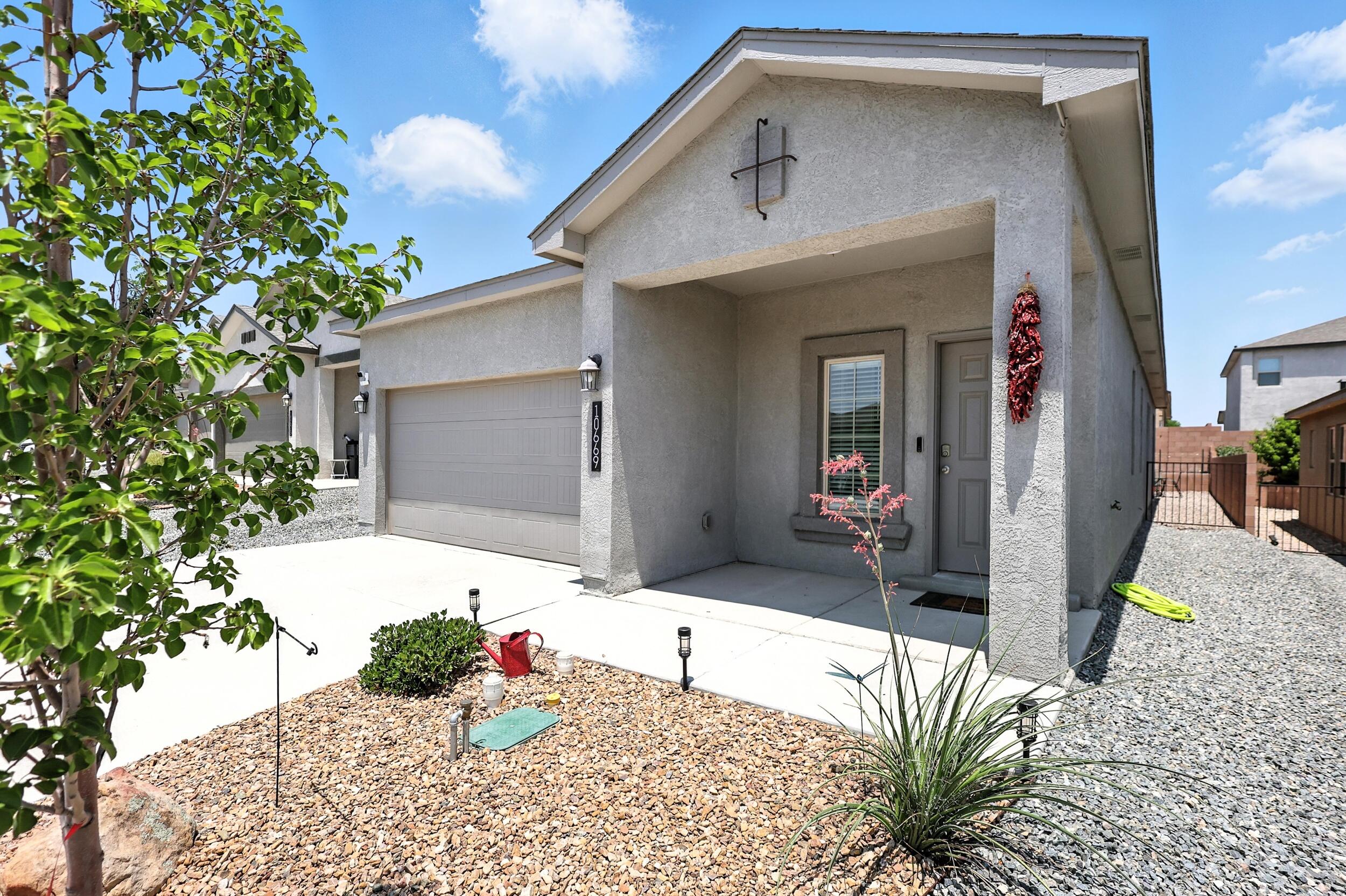 Welcome to this beautiful 3-bedroom, 2-bathroom home located in the gated Aspire community in Southwest Albuquerque. Just 3 years old, this home features an open-concept layout with stylish tile flooring throughout the living room, kitchen, and dining area--perfect for easy maintenance and a clean, modern look. The spacious kitchen offers ample counter space and flows seamlessly into the main living areas, making it ideal for entertaining. Located in a gated, master-planned neighborhood with parks, walking trails, and community amenities, this home combines comfort, convenience, and peace of mind.
