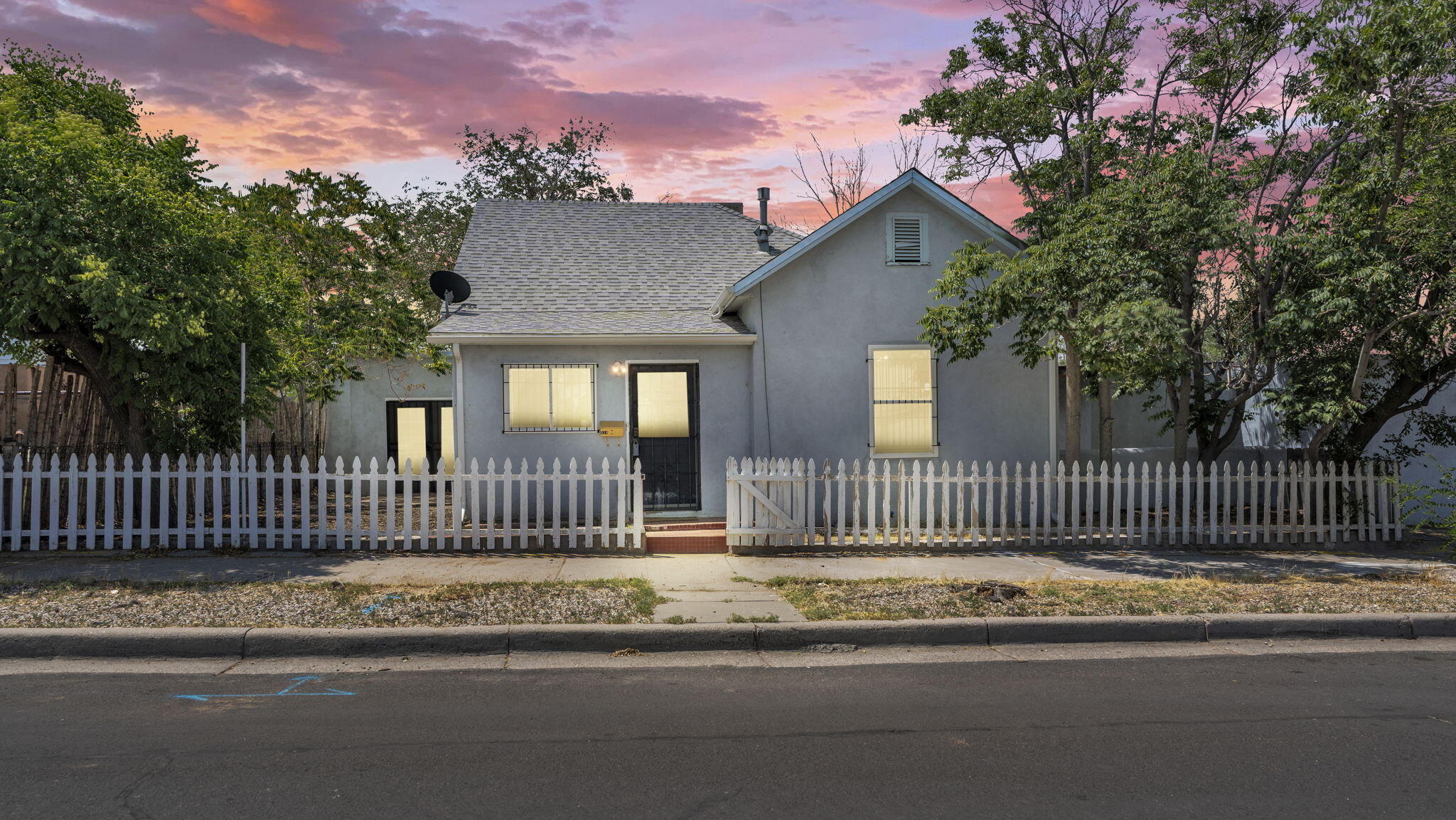 Discover charm and convenience in this 3 bedroom, 1 bathroom home located in the Highland Heritage area of downtown Albuquerque. Just minutes from EDO, local restaurants, and entertainment, this property offers both lifestyle and location.Recent updates include new flooring and carpet, brand new dishwasher and stove, a 2021 refrigerator, and a 2020 bathroom remodel for a fresh, modern feel. The home also features a 2020 hot water heater, new stucco and gutters, and a gas furnace installed in 2019--giving you peace of mind and energy efficiency. Step outside to find a detached storage dwelling with great potential--easily transform it into a cozy casita, art studio, or guest space.