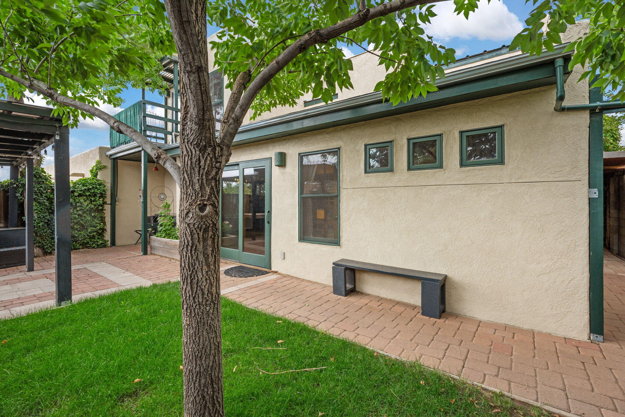 OPEN HOUSE THIS SATURDAY 1-3 Beautifully updated 2-story townhome with owned solar and stunning details throughout! Step inside to red oak floors, ceramic slate-look tile, and Pella windows that fill the space with natural light. The kitchen and bathrooms are fully updated with modern finishes you'll love. Enjoy an epoxy-finished garage with an electric car plug-in. This home is move-in ready and filled with quality touches--come see it in person and fall in love!