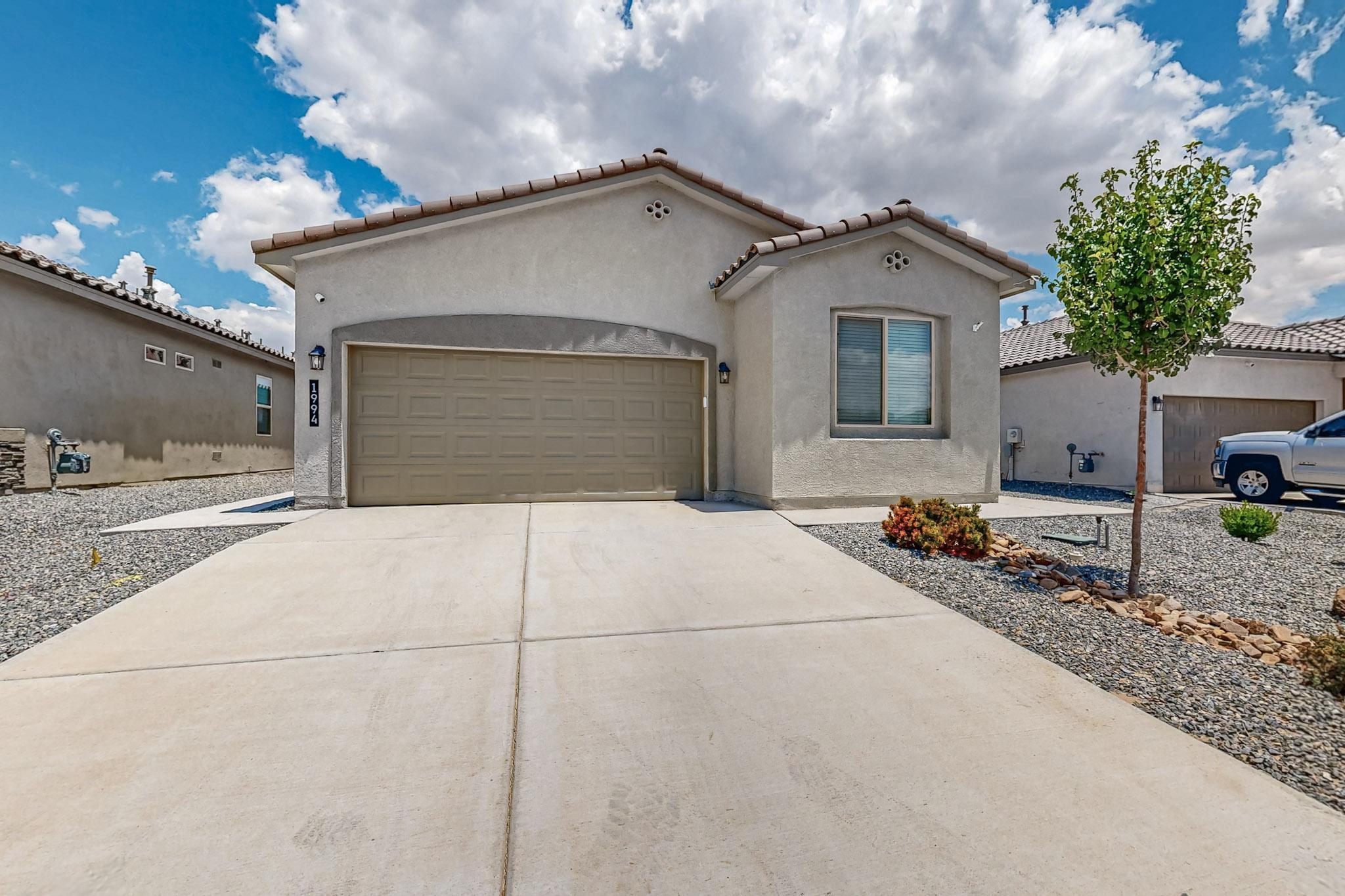 Welcome to this beautiful, 2 years young, home offering modern comfort and thoughtful upgrades throughout. This spacious 4-bedroom, 2-bathroom home features a bright and open layout, perfect for both relaxing and entertaining. The primary suite is a true retreat with a walk-in closet & double sinks, The kitchen is equipped with sleek granite counters, large island, and opens to the living and dining areas. Enjoy the convenience of a separate laundry room and a finished garage for additional storage or workspace. Situated on a premium lot with stunning mountain views, the outdoor space is just as impressive. Both the front and backyard are fully landscaped, providing low-maintenance beauty and functionality in a desirable community.