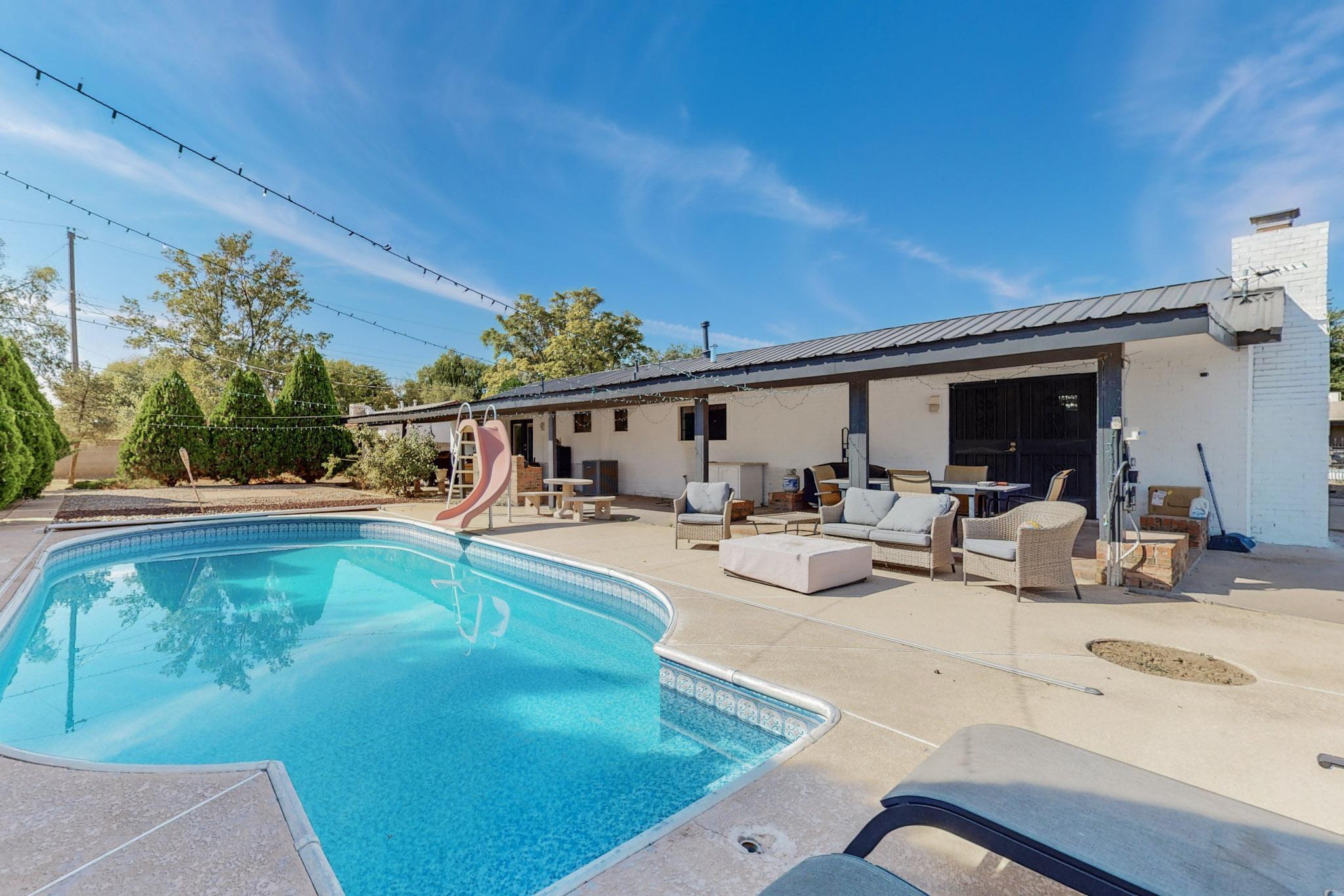 This beautiful remodeled home features modern elegance and classic charm. Located in a private neighborhood. This property sits on nearly half an acre, which includes a private pool and backyard access. The open living space and gourmet kitchen is perfect for entertaining with stainless steel appliances, quartz countertops, and a stylish backsplash, a large island and a adjoining dining area. Schedule your showing today!!