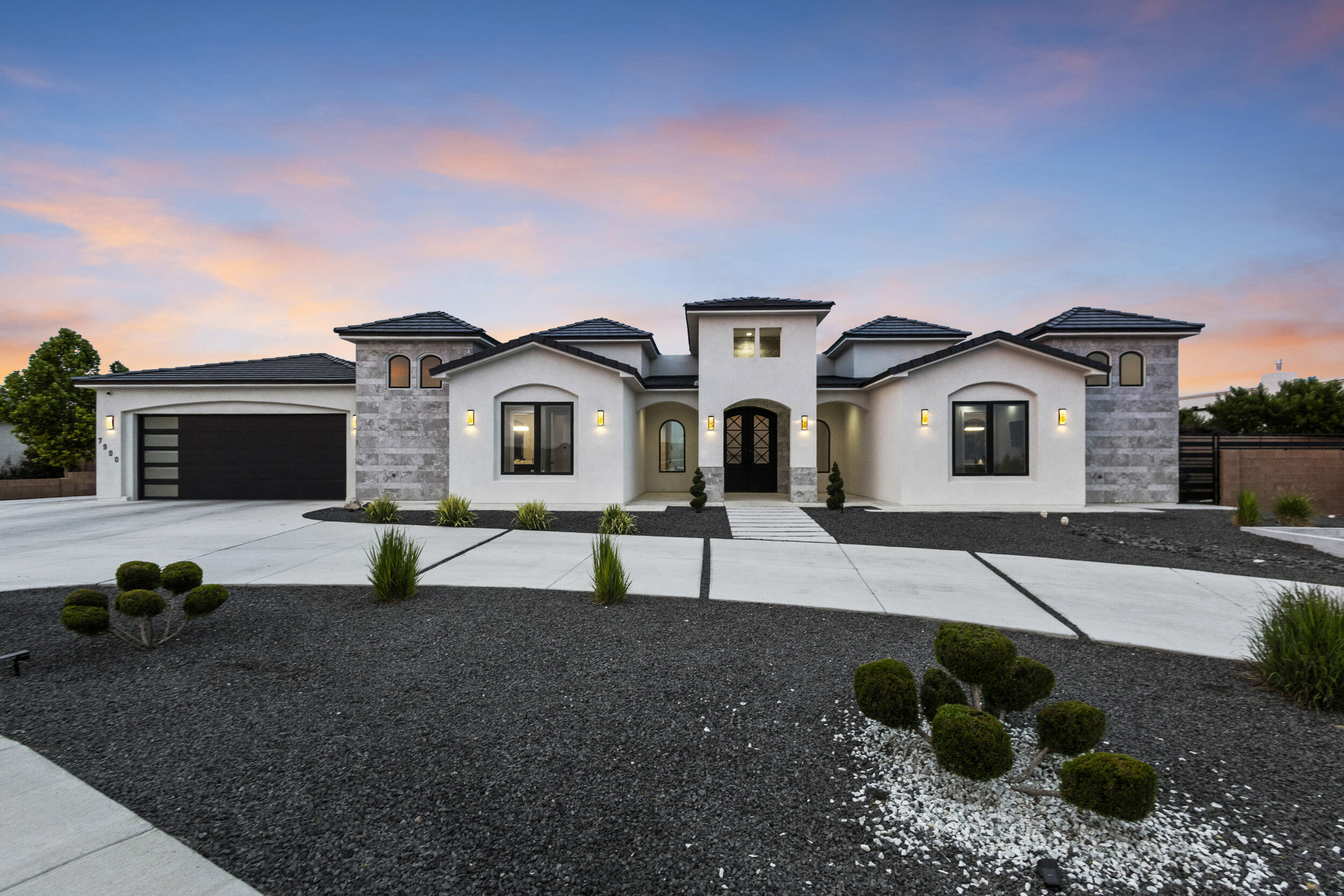 Stunning contemporary 5-bed Candelaria Custom Home with 4,843 sq ft heated and 8,897 sq ft total indoor-outdoor living. Features include a two-way glass fireplace, theater room, resort-style pool with fire/water features, and in-ground trampoline. Gourmet kitchen with Thermador appliances, baker's pantry, and custom cabinets/lighting. Seamless indoor-outdoor flow, spa-like bathrooms, and 6-car garage. Ideal for luxury living and entertaining. Exceptional craftsmanship, modern design, and premium finishes throughout. Don't miss this one-of-a-kind Westside estate--schedule your private showing today!