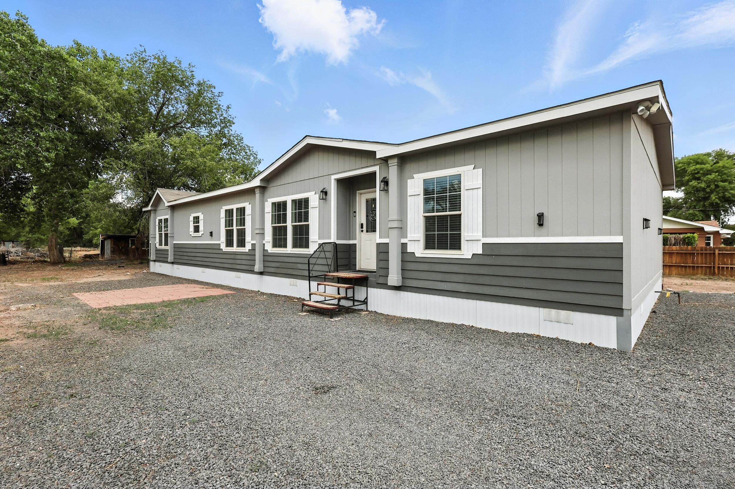 Welcome to your New Home! Complete with over 2,300 sq. ft. This home offers an open-concept floor plan with abundant natural light, a beautiful kitchen and 2 large living areas that are perfect for entertaining. The primary suite features a private bath and large closet. The additional bedrooms are very spacious with ample closet space. Sitting on .75 acre this property also has tons of potential for outdoor living. This home is centrally located and has easy access to shopping and schools.
