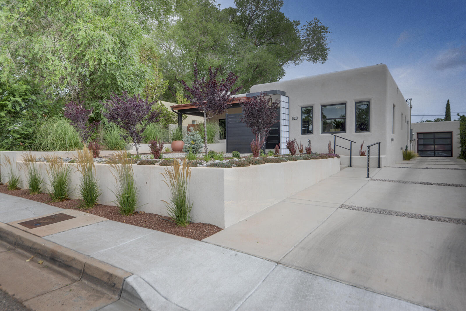 Gorgeous Renovation & Transformation to an Amazing Home of Sophistication, Refinement & Style! Indulge in the Art of Living! Perfectly manicured xeriscaped yard invites you in yet creates privacy - a rare combination! Dramatic Coved Ceilings in Living & Dining Rooms are complemented by gorgeous rich wood floors with windows providing abundant light creating a ying-yang experience like no other! The AMAZING kitchen is functional  beauty in motion with no detail overlooked - the cabinets complemented by a subtle flowing granite countertop bring freshness & energy to the space. The zen inspired private backyard bursts with areas of color while the spaciousness of it allows creativity to grow. Casual den, peaceful primary & charming guest room add to the perfection! Blocks to UNMH + Nob Hill!