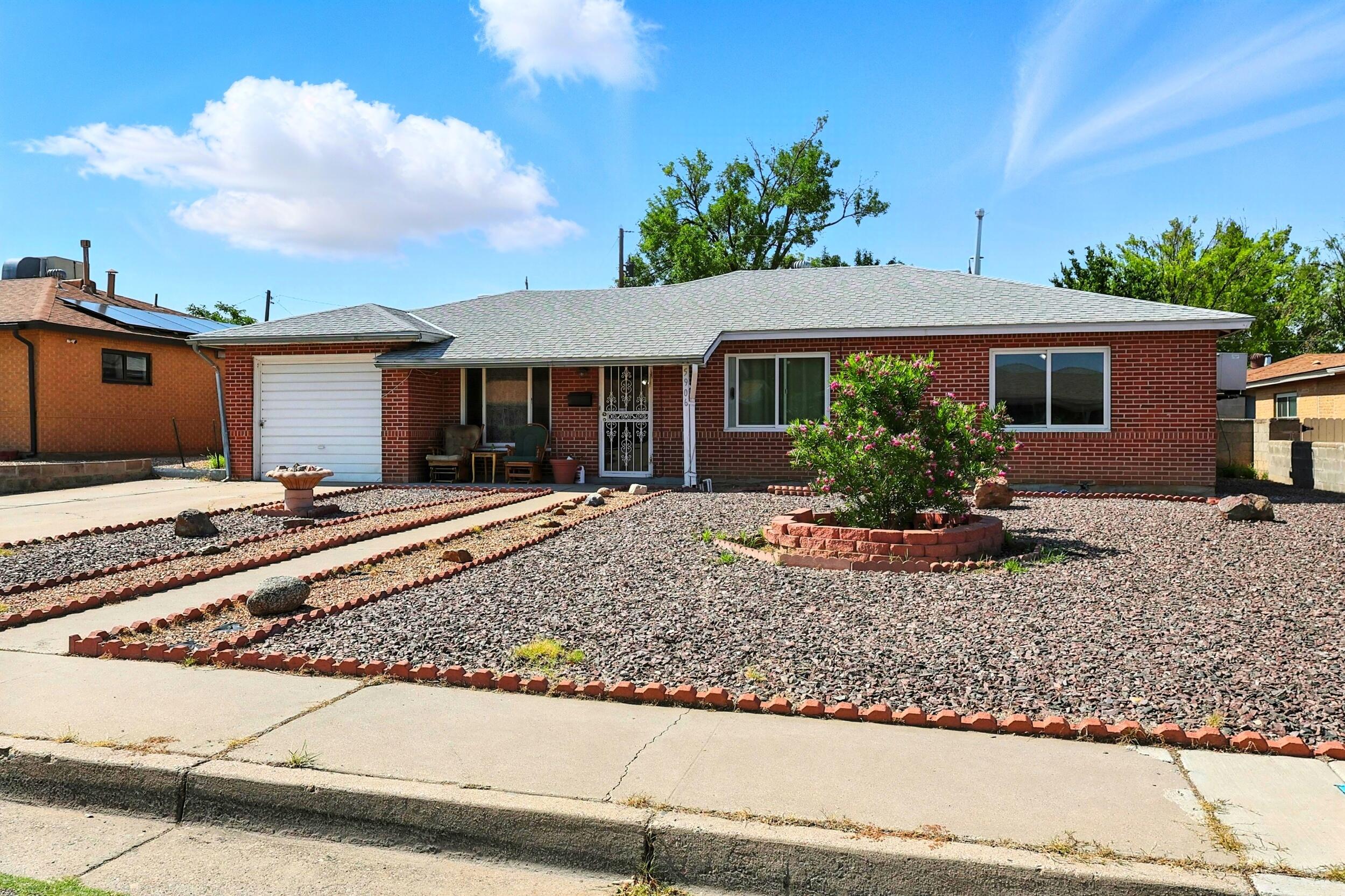 Well-maintained 3 bed, 2 bath brick home in the Northeast Heights, Uptown area. Spacious kitchen with ample cabinetry and counter space. Single-car garage, separate laundry room, and large backyard with block wall, storage shed, and covered patio, ideal for outdoor living. Low-maintenance front yard landscaping adds great curb appeal A solid home in a convenient location!