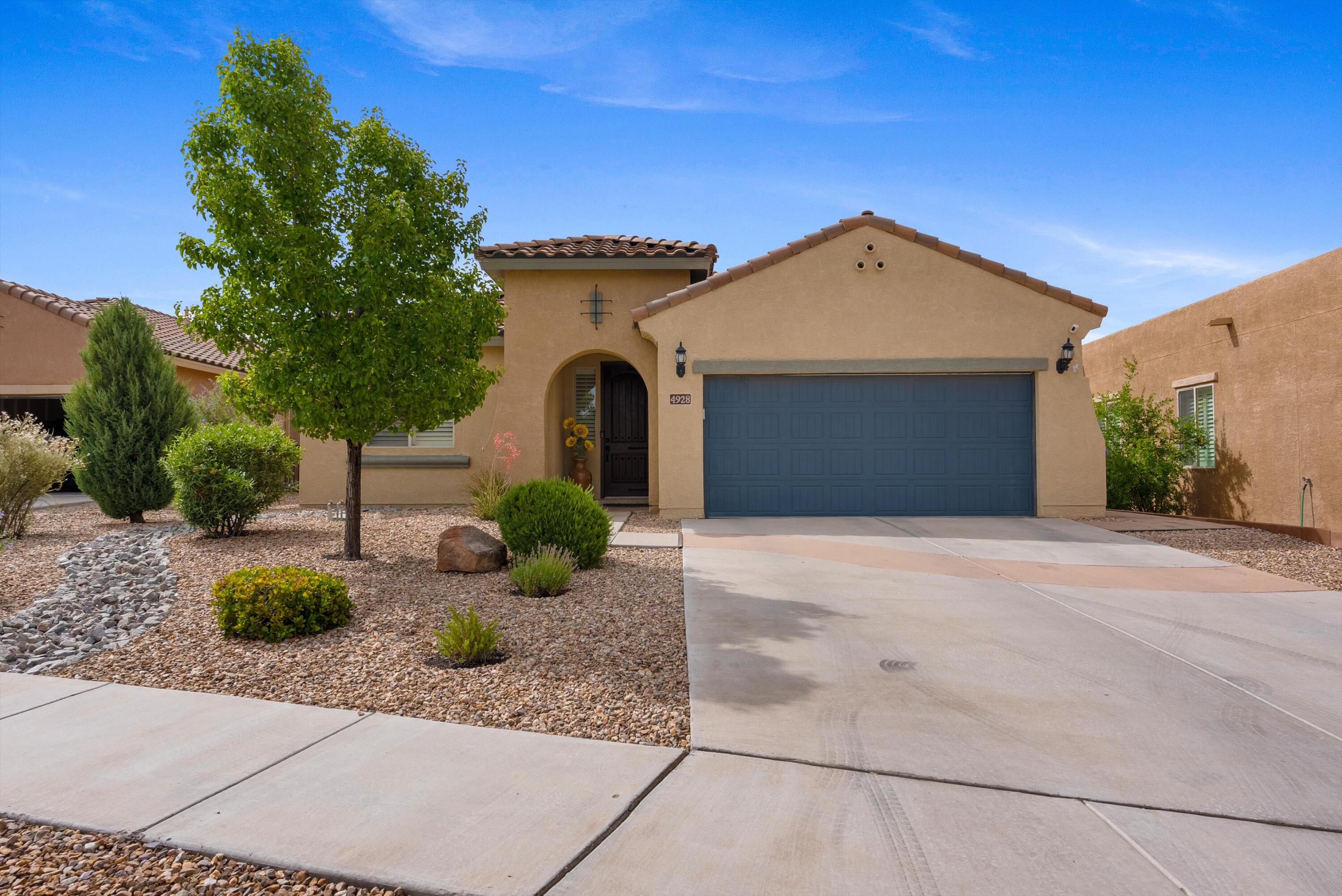 Stunning Pulte home in Anadalucia on a premium View Lot.  This home features a large open kitchen with abundant storage, granite counters, custom backsplash, and stainless appliances.  Expansive family room is light & bright & features patio access.  Primary suite is separate from the other rooms and offers a bay window & lovely bathroom w/two sinks, garden tub, shower & walk-in closet.  Front room could make for a great office or workout space.  Wood plantation shutters throughout. 3 car tandem garage w/utility sink. You'll want to relax in this professionally landscaped backyard with a large covered patio, syn-lawn, paver stone patio with mature plants & flowers.  No neighbors behind you, & great views of the Sandias. Walk to bosque trails & city park nearby.