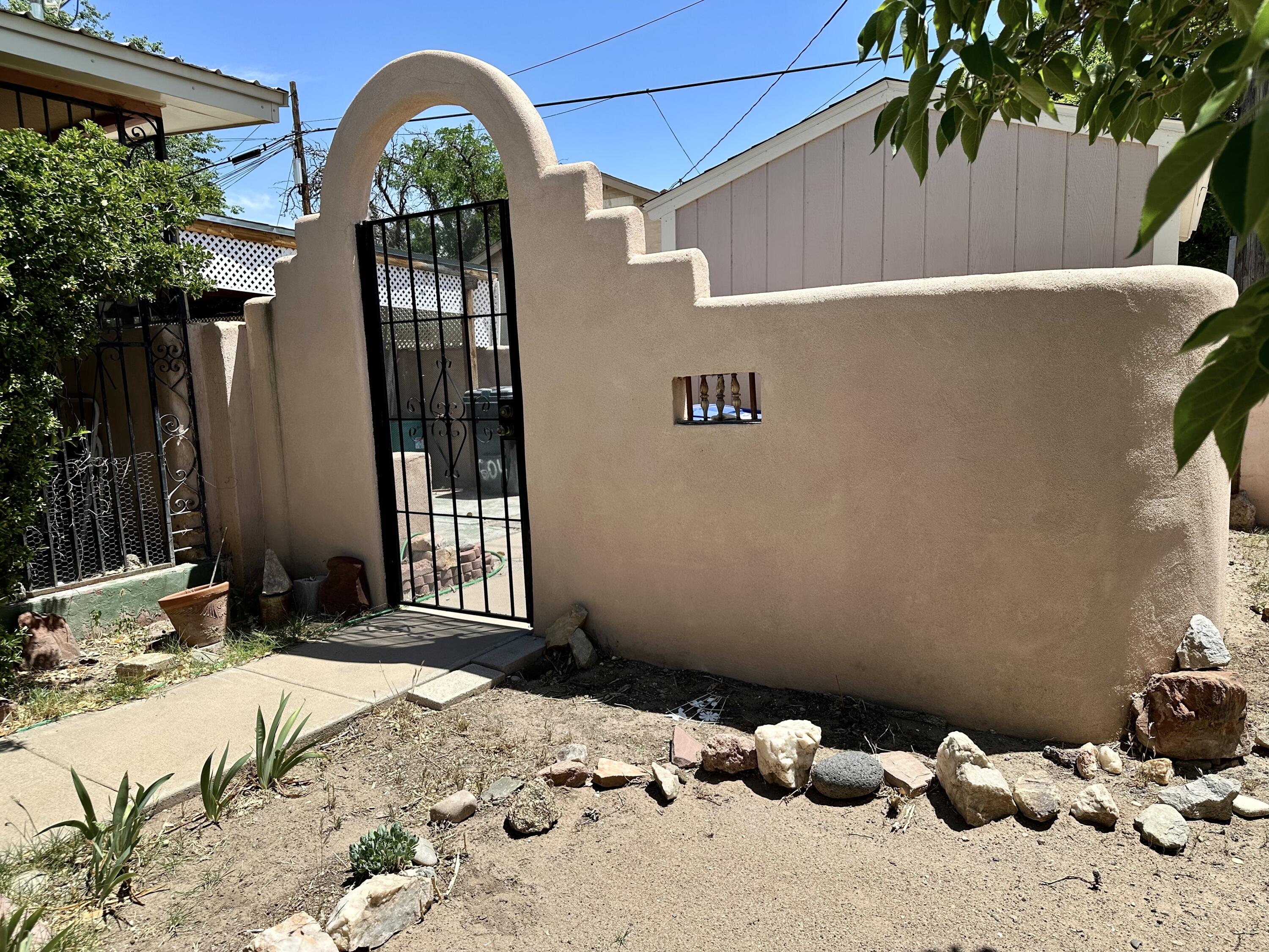 3-Bedroom Home with SystemUpdates in Prime Barelas/Downtown Location: Welcome to 604 9th St  a 3-bedroom, 2-bathroom home offering exceptional comfort, reliability, and unbeatable convenience in one of Albuquerque's most walkable and culturally vibrant neighborhoods.Enjoy the best of both worlds: timeless charm and major upgrades. Recent improvements include a new heating and electrical system (2022) ,new water pipes installed  (2024), and a newer water heater, giving you peace of mind for years to come. Inside, the functional layout features comfortable living spaces, a roomy kitchen area with all appliances included, plus an in-home washer and dryer, saving you thousands in move-in costs. Outdoors, there is a low maintenance yard offering storage options with three