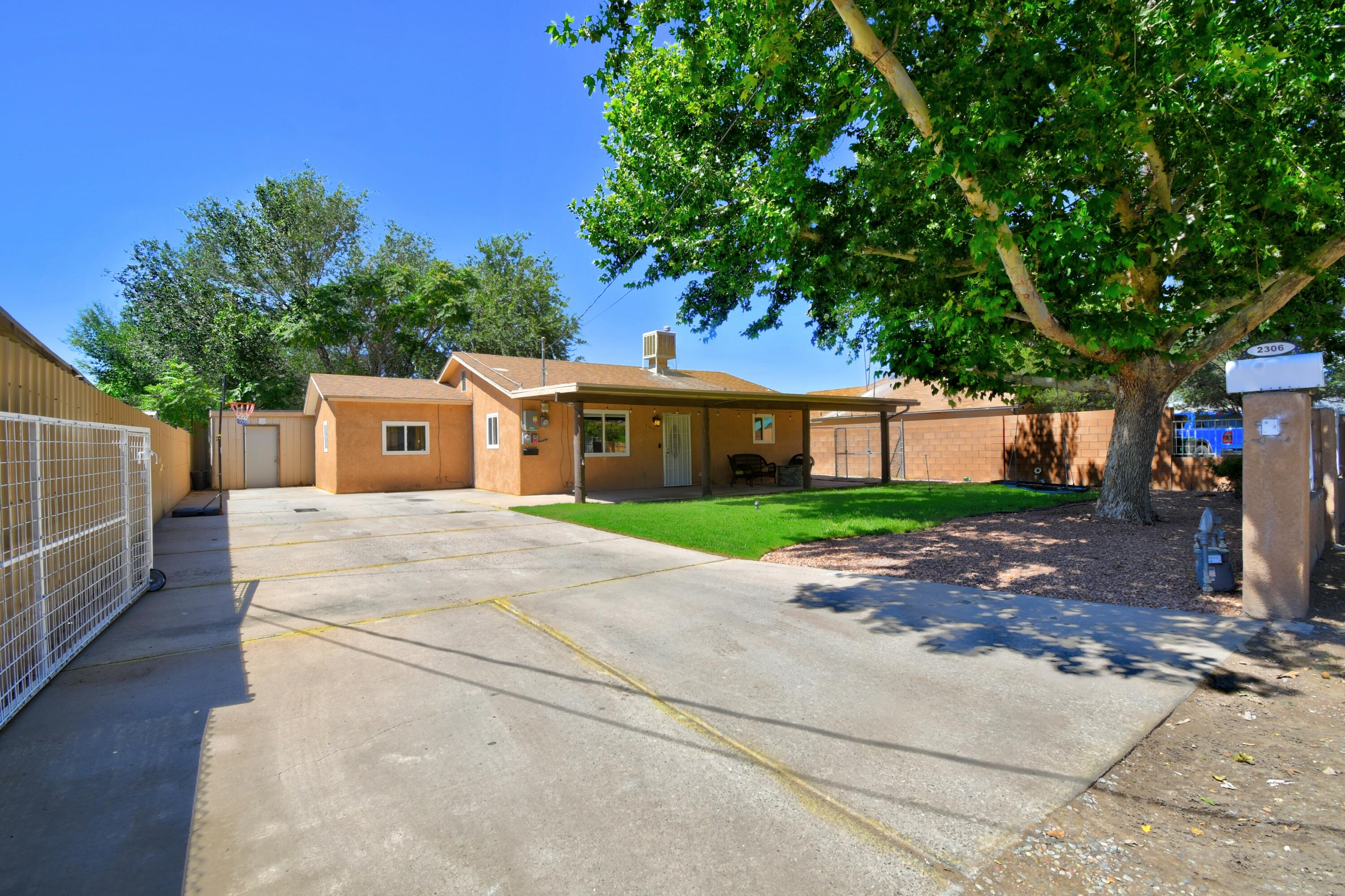 Step into comfort and style with this inviting 3-bedroom, 1-bath home! This property showcases an updated open concept layout that encourages gathering and connection. The beautiful kitchen features elegant butcher block countertops, making meal prep a pleasure. With thermal windows that enhance energy efficiency and a charming covered porch to enjoy tranquil moments outdoors, this residence is a true gem. The spacious gated driveway provides ample parking and peace of mind, all set within a lovely shaded lot. Experience the joy of homeownership in this wonderful property!