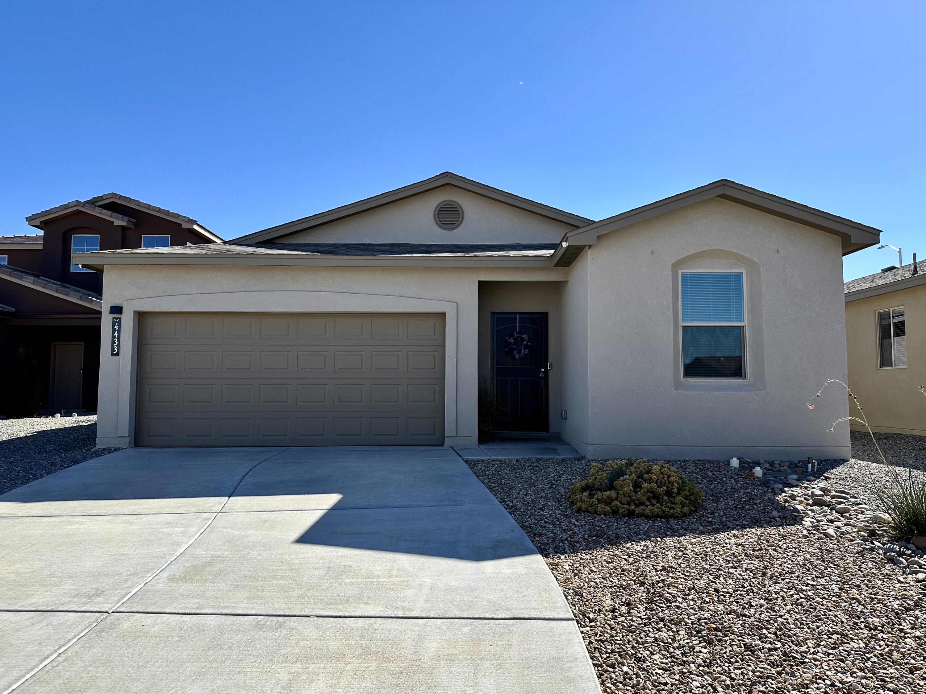 Step into this stunning, well-maintained, and newer Twilight Home, perfect for families seeking comfort and style. As you enter, you'll be greeted by a spacious open floor plan adorned with elegant tile flooring in the main areas, creating a seamless flow throughout. Home features Fully PAID solar panels, worth $20K, offering significant savings on PNM Bills. The inviting living room features a cozy gas fireplace, ideal for those chilly nights spent with loved ones. The heart of the home is the expansive kitchen, boasting a large island that provides ample space for meal prep and casual dining. Equipped with modern stainless steel appliances, this kitchen is not only functional but also a stylish gathering spot for family and friends.