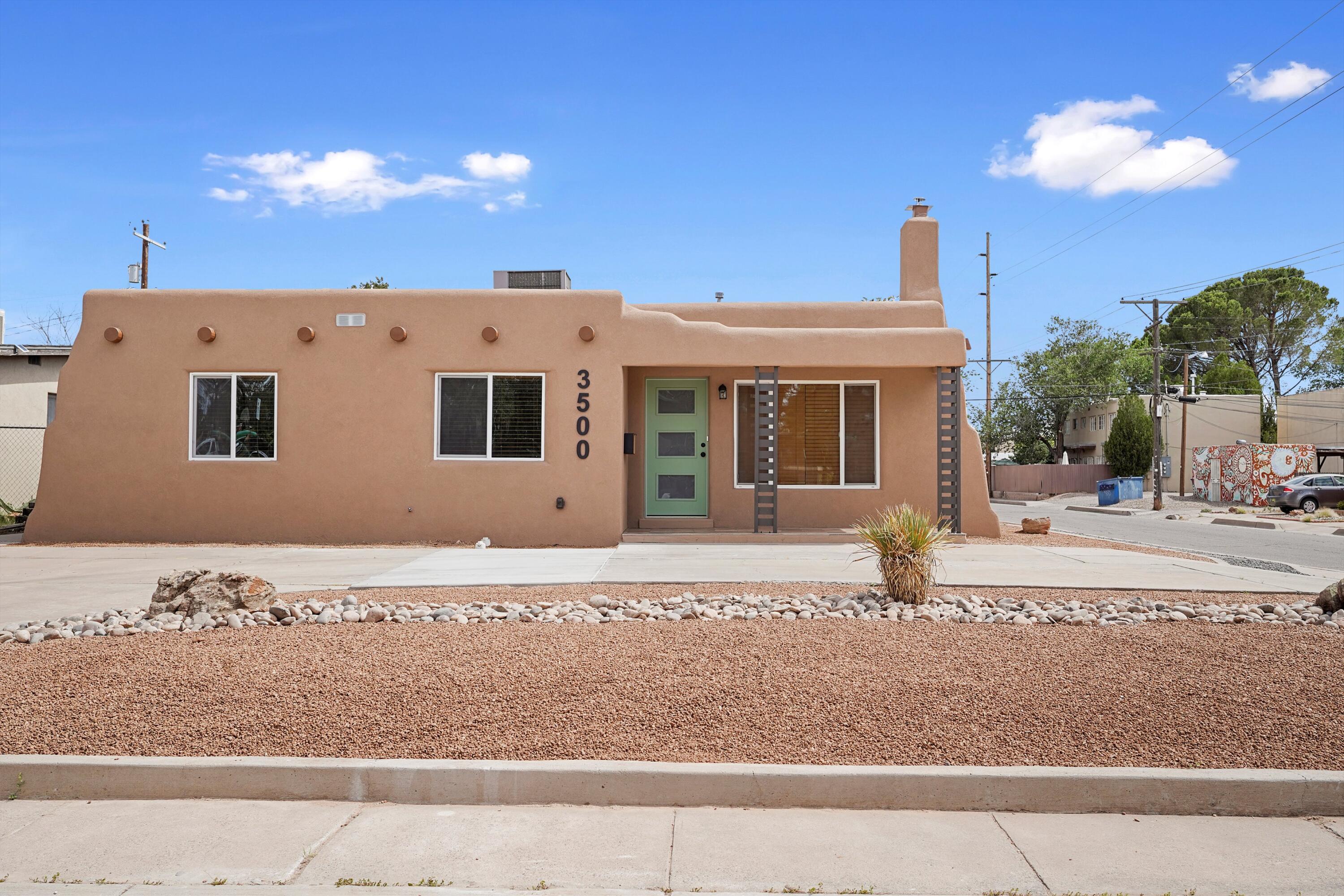 Beautiful South UNM home with a bright and inviting floorplan. All new kitchen features custom handmade cabinets, high-end stainless appliances, and tons of storage. Two full baths have been completely remodeled with new tubs, tile, plumbing and floating style vanities. New weather-proof synthetic stucco, new thermal pane windows, and new refrigerated a/c. Property is fully xeriscaped front and rear. Bonus: 1br attached casita not included in sq ft, totally remodeled and ready to rent out or ready for extra family members! Come see this incredible home!