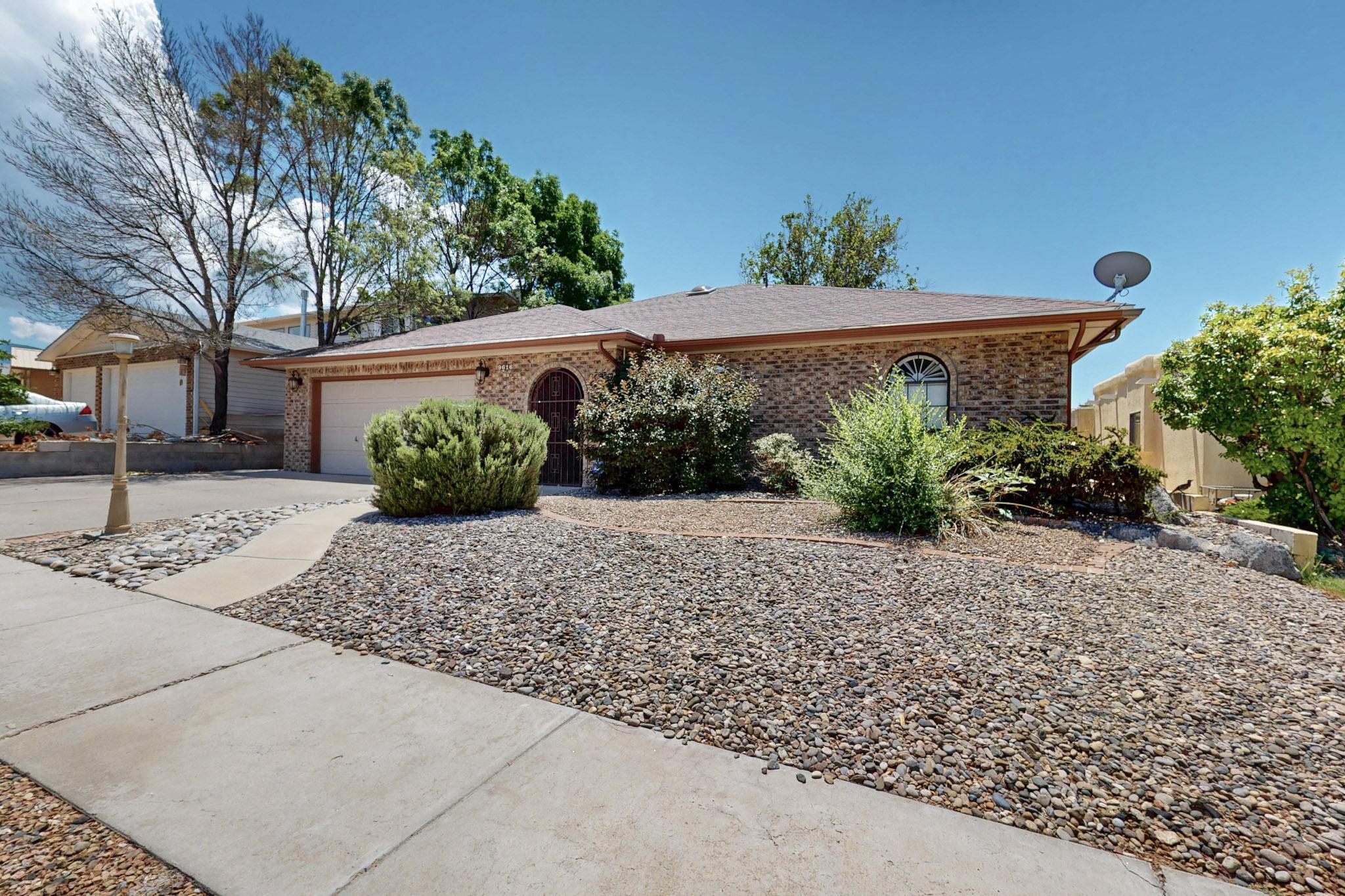 Stunning single-story gem in desirable Heritage East neighborhood! Highlights include refrigerated air, stylish wood-look tile flooring, skylights, recessed lighting, and sleek modern lighting. The chef's kitchen features granite counters, stainless steel appliances, a spacious island, and flows into a generous living room with a warm brick fireplace. The elegant primary suite offers dual sinks, a soaking tub, two closets and a separate shower. Don't miss the approx. 200 sq. ft. sunroom (not in sq. ft.) with independent heating/cooling--ideal for an office, studio, or playroom. Beautifully landscaped yards and a handy storage shed complete the home. Pride of ownership is evident throughout! Call today for your showing.