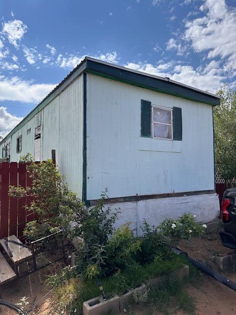 Great opportunity at a rare price point! This manufactured home is full of potential and ready for your vision. With owned propane, septic, and city water, this property offers flexibility with cash or REC terms available. Home is not on a permanent foundation and does not has a deactivated title. A great fit for investors or those looking for a project. With some work, this could be a fantastic long-term investment or affordable living option. Don't miss your chance to own at this price!