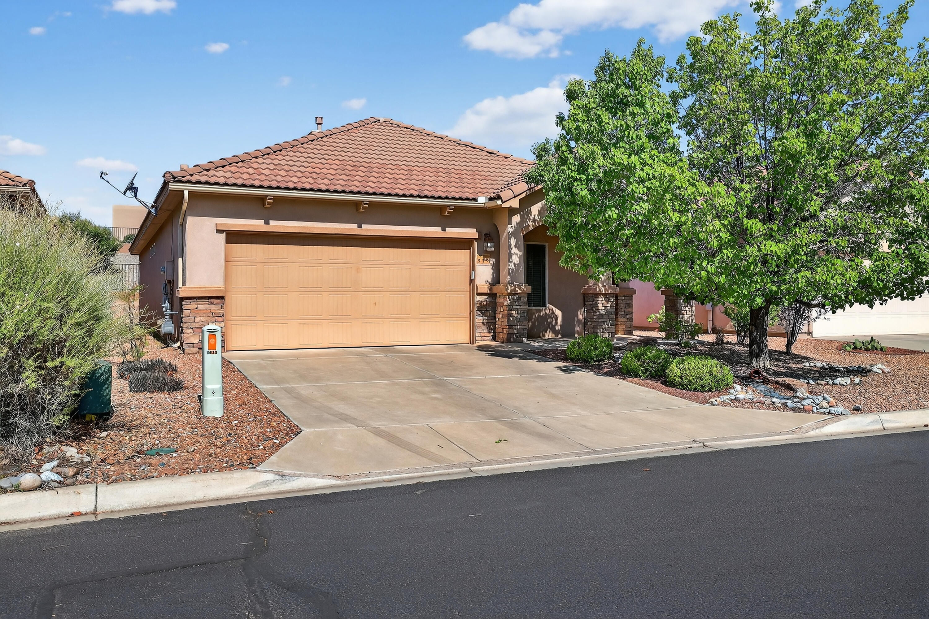 Welcome to beautiful Del Webb Alegria, a 55+ gated community.  Capulin floor plan with upgrades.  Pitched tile roof & stone exterior accent. Open floor plan seamlessly connects dining area, kitchen, & great room with cozy fireplace. Kitchen features granite countertops, tile backsplash, island, gas cooktop, built-in oven & microwave, new refrigerator 2024, pantry, window seat & skylights.  Primary bedroom features walk-in closet, dual sinks, spacious shower with bench & linen closet.  Office with French doors.  Covered front porch & back patio. New washer & dryer 2024.  New carpet 2024. Community center with indoor/outdoor pools, spa, fire pit, & fitness center.  Other amenities include bocce court, putting green. & horseshoe court.  Recreational paths & private access to the Bosque.