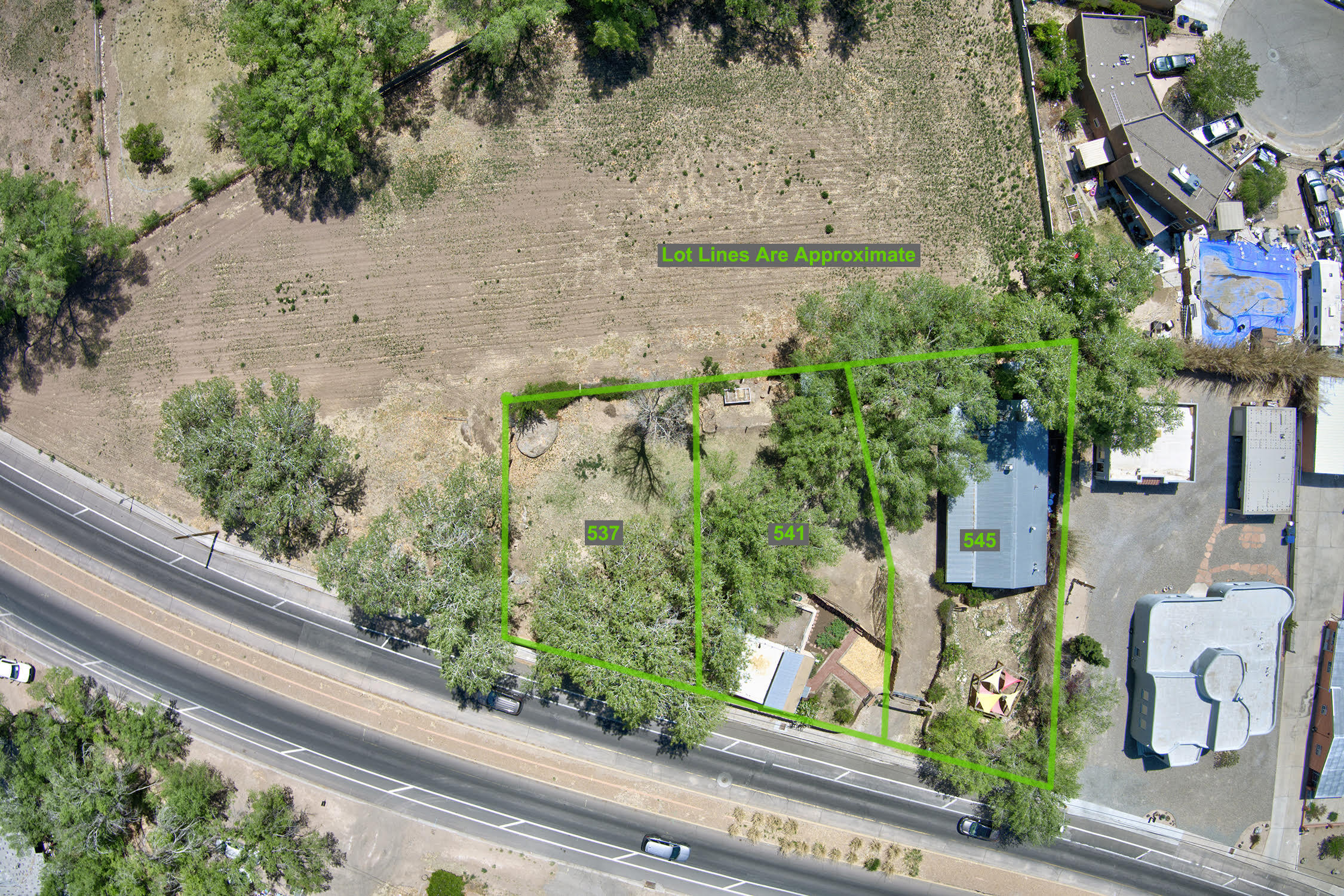This property, along with the attached lot, is now being offered separately from 545 Atrisco! Also available as a package deal, MLS number 1083024. This one bedroom adobe home dating back to at least 1930 sits on a .1463 acre lot, and comes with the adjacent lot which is .1408 acres. It's a lovely jewel with fresh paint, a cool bathroom, and amazing sun porch, where you can sit and enjoy the bosque surrounding you.