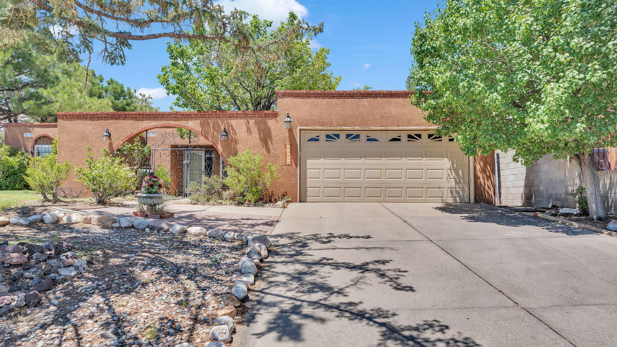 Welcome to this well-maintained gem nestled in the desirable Glenwood Hills neighborhood! Situated on a spacious corner lot, this home offers both front yard and convenient side yard parking. With over 2,000 square feet of living space, enjoy two separate living areas, perfect for entertaining or relaxing.Take in the stunning mountain views right from your doorstep, and embrace the active lifestyle with hiking trails and parks just moments away. Located off Tramway and Comanche, this home combines comfort, space, and location in one perfect package.