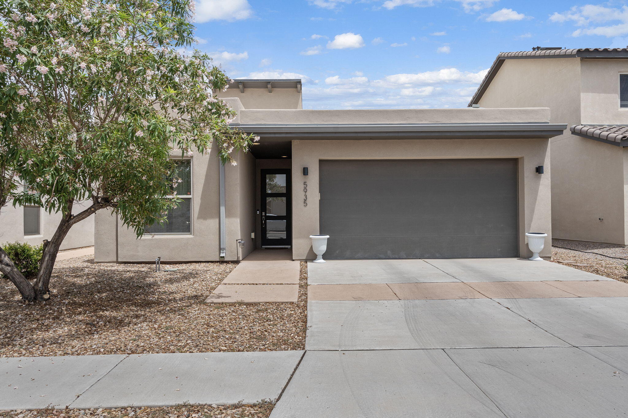 Welcome to this gorgeous and meticulously maintained single-story home, offering the perfect blend of comfort, style, and functionality.Enjoy an open and bright atmosphere with thoughtfully designed living spaces that offer both comfort and flow. The heart of the home features a beautifully designed kitchen with a generously sized island and seating; ideal for entertaining or casual meals.The primary suite is a true retreat, complete with a spa-inspired bath featuring dual vanities, a freestanding soaking tub, a walk-in shower, and a large walk-in closet.Enjoy outdoor living under the covered patio, perfect for relaxing or hosting guests year-round.Don't miss the opportunity to make this stunning home your own--schedule your private showing today!