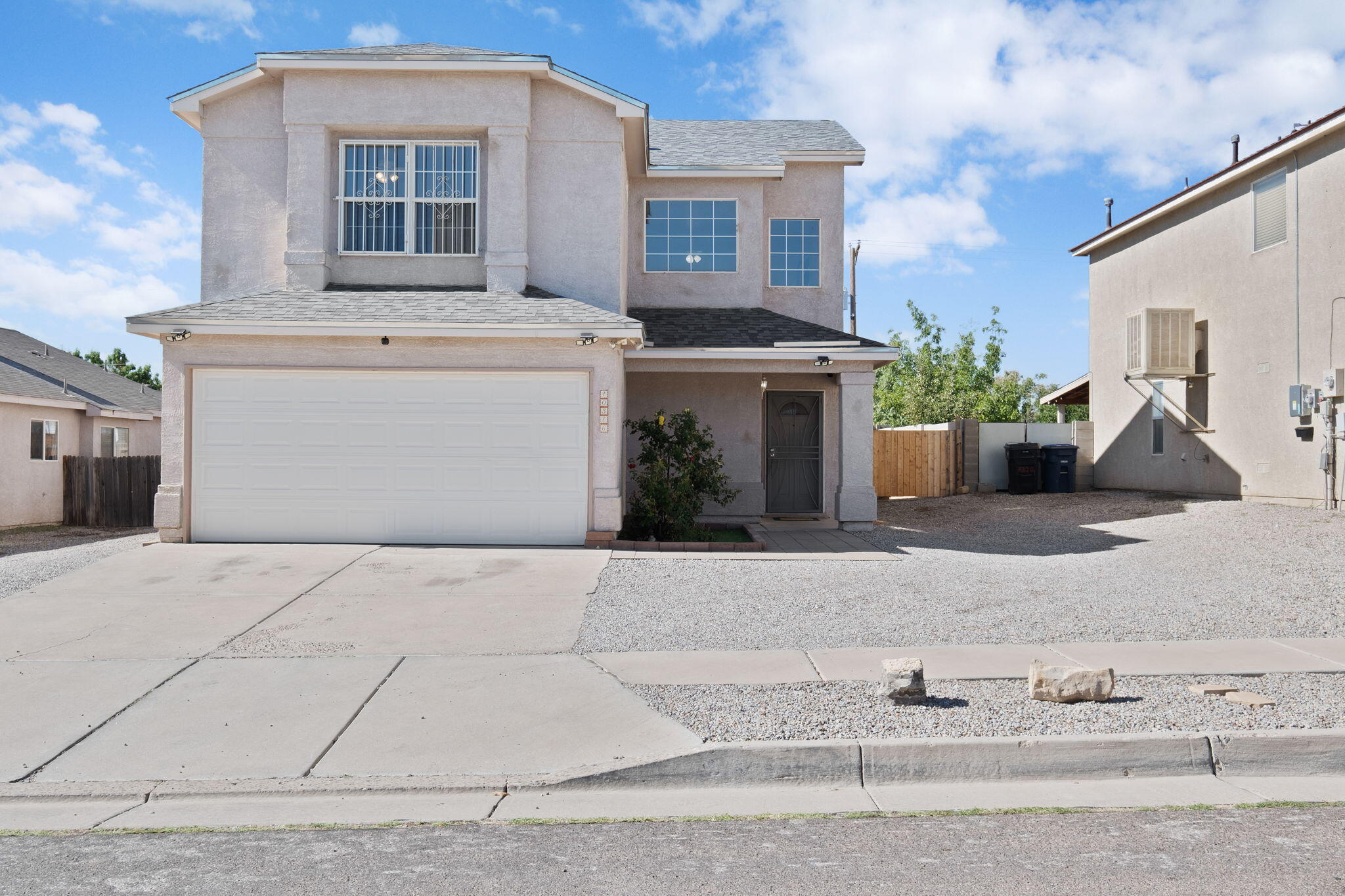 Spacious, bright, and move-in ready with over $18K in recent upgrades! This well-maintained home features marble floors in the living room, a gas fireplace, and newer luxury vinyl flooring on the main level. The open kitchen includes updated appliances. Fresh paint, baseboards, and hardware are throughout the home. This super spacious primary suite has a large walk-in closet, and both secondary bedrooms also feature walk-in closets. Roof is only three years old.  Wrought iron security bars, two-car garage, and hard to find backyard access on both sides of home! Large backyard with endless potential.  Easy access to I-40. Don't miss this beautiful, light-filled home! RV will be removed before closing day.