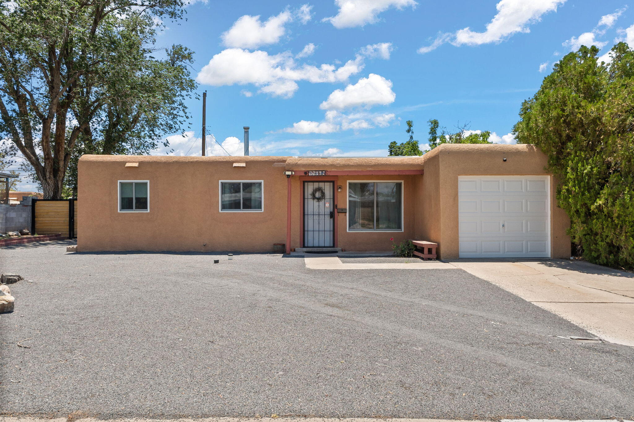 Chic & modern- this 3-bedroom home is stunning! Unparalleled updates for this price point; the kitchen has newer soft-close cabinetry, stainless steel appliances, undermount sink & an abundance of quartz countertops. Newer flooring & lighting, windows have been replaced by Renewal by Anderson, newer H2O heater + cleanouts, upgraded electrical & newer roof! Enjoy the luxurious, efficient mini-split HVAC systems. French Doors lead to the spacious backyard w/ custom side gates, turf, open & covered patio spaces + shed! The renovated bathroom features subway tile surround @ the shower/tub, double vanities & custom mirrors + lighting! Finished garage has plenty of room for a vehicle + storage! Located near parks, shopping, restaurants & easy access to I-40! Schedule your private showing today!