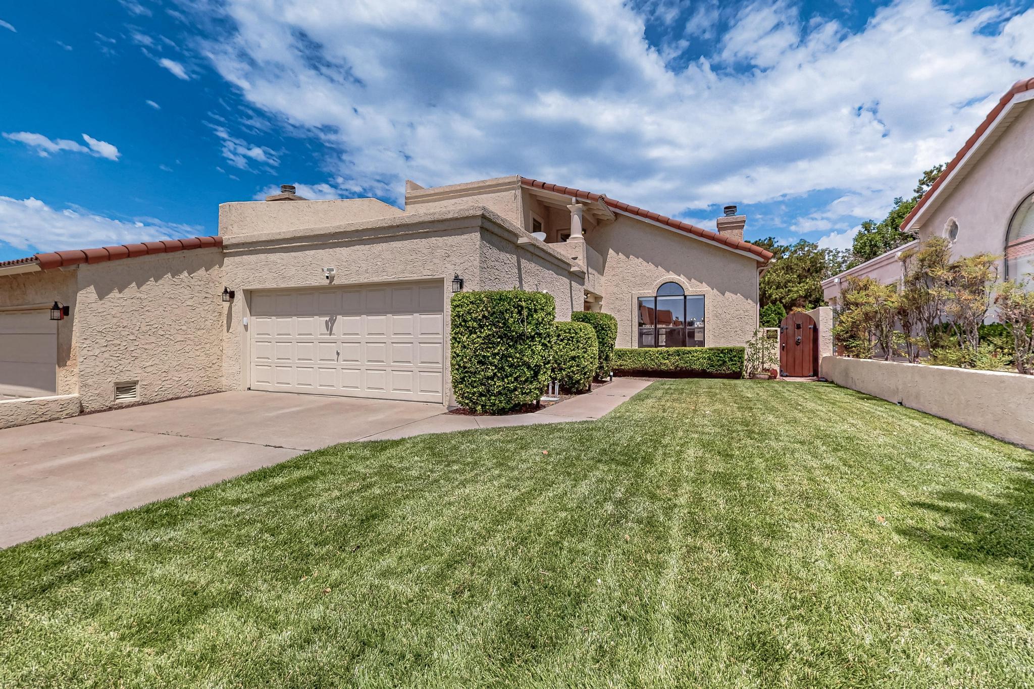 Love where you live in Academy Ridge without having to lift a finger. The most discerning eye will notice a manicured front yard, Sandia mountain views, and impeccable natural lighting. With modern comforts and amenities like a soaking tub in the primary bathroom, granite countertops and stainless steel appliances in the kitchen, and multiple outdoor living areas including an upper balcony, you'll find comfort in knowing your home is there to greet you at the end of each day.With two bedrooms downstairs sharing a full bathroom, and the upper primary suite having enough space for a loft office, the home's versatility will be appreciated as well.Close to mountain trails, shopping, and dining, evening drinks, and entertainment - this neighborhood has it all!