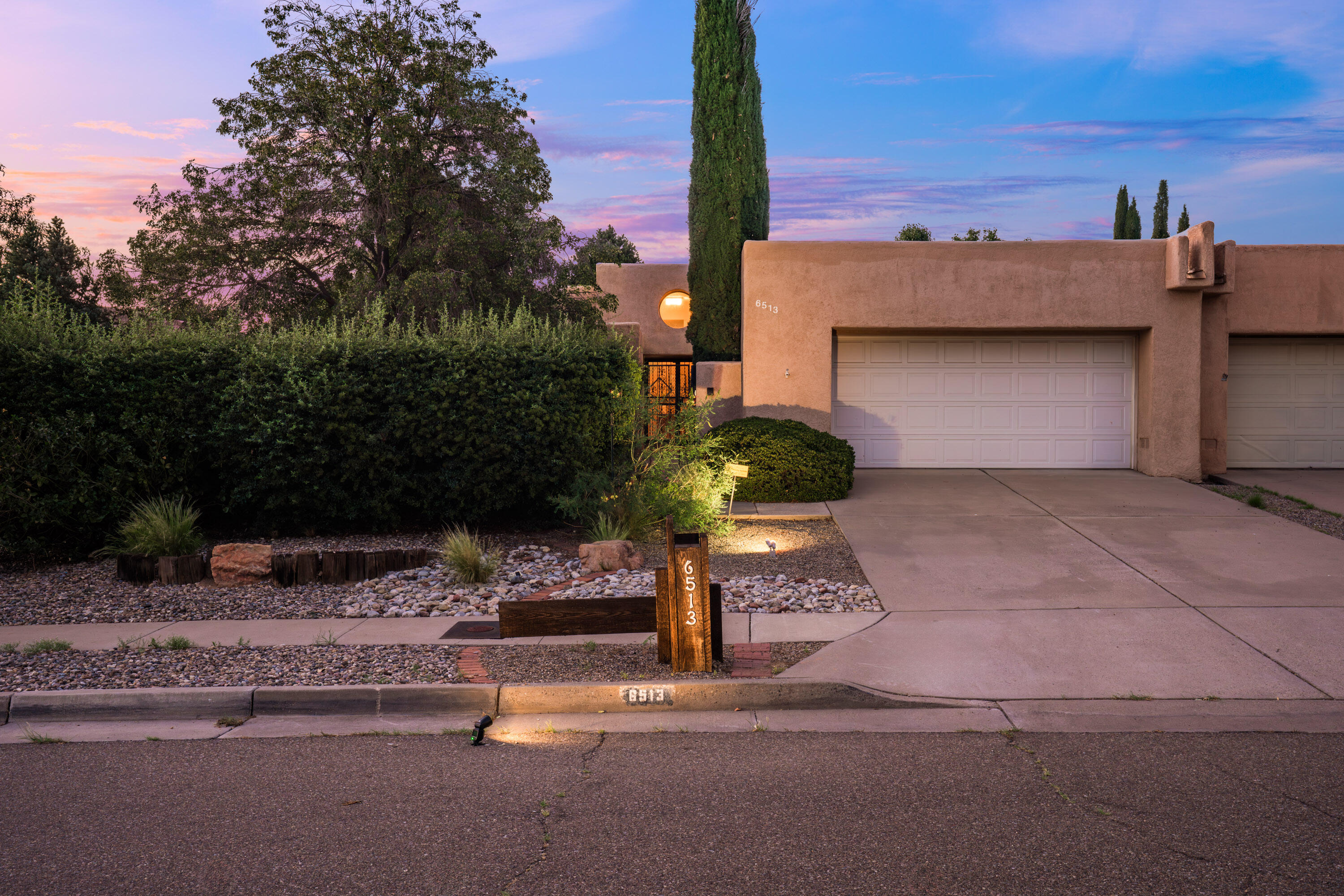 Incredible opportunity in Leslie Park! Welcome to this bright, beautiful, move-in ready single-story townhome, perfectly nestled in Albuquerque's Northeast Heights. NO HOA! Wood-look tile throughout, no carpet. *Refrigerated air* for optimal climate control. Spacious primary suite with double sinks, large walk-in closet, private patio access. Indulge in outdoor living on multiple covered patios, where you can relax and unwind while enjoying the privacy and tranquility of your backyard oasis. Convenience is at your fingertips with this home's superb location, offering easy access to everything you desire. Whether it's shopping, dining, or recreational activities, you'll find all the amenities you want just a short distance away. Green, grassy park w/ playground nearby!