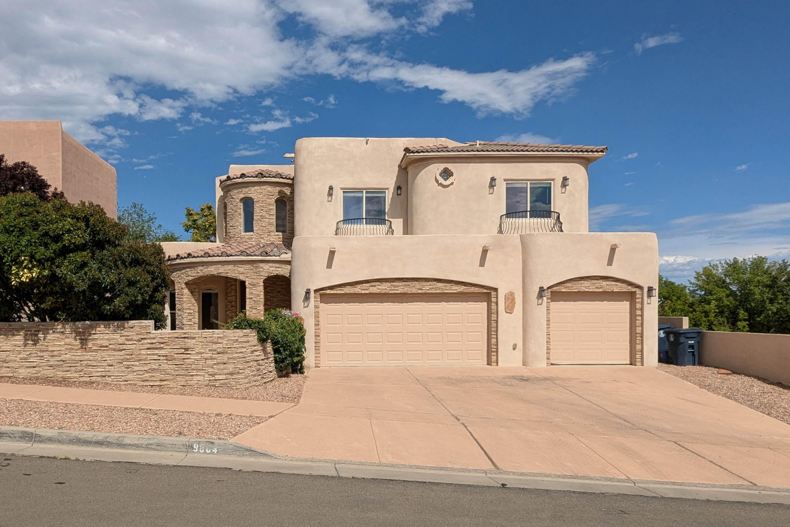 Located in the desirable Knolls of Paradise, this lovely custom home has 5 bedrooms, 4 bathrooms and 3-car garage. The large 2-story great room is highlighted by custom stacked stone fireplace. Gourmet kitchen features alder cabinets, granite countertops, stainless appliances including oversized refrigerator, walk-in pantry and breakfast nook. Two bedrooms on first floor including in-law/guest suite with private bath walk-in closet and direct access to backyard patio. Upstairs has loft, two bedrooms with jack and jill bath plus large primary suite with walk-in closet with built-ins, bath with dual sink vanity, jetted tub and separate shower and a private balcony with mountain and city views. Backyard has large covered and open patio with water feature. New TPO roof and new stucco in 2025