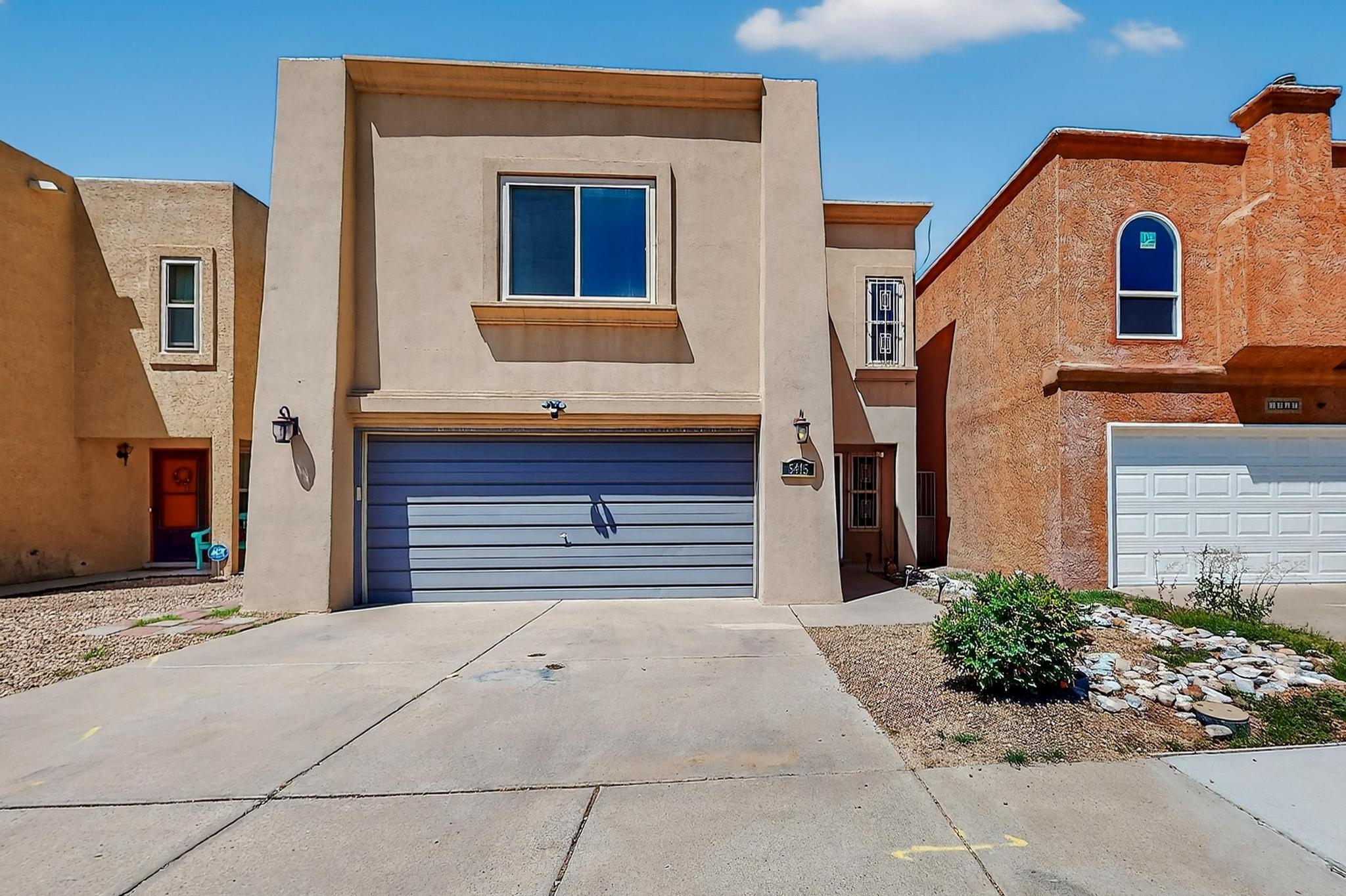 If you're looking for a spacious home in a highly rated school district in Albuquerque, look no further! With four bedrooms upstairs and a bonus office that could easily be a fifth bedroom, the home is designed to be comfortable for a variety of uses.Your updated kitchen has stainless appliances, granite countertops, and lots of cabinetry for storage, or if you prefer cooking and grilling outside, check out the outdoor covered kitchen area! Grow your own vegetables in the garden bed area for your meals! The refrigerated air conditioning is amazing in the hot summer Albuquerque months. An open living room, fully finished garage, and tankless on-demand water heater bring all modern comforts into your home. Minutes from expansive trails and outdoor recreation!
