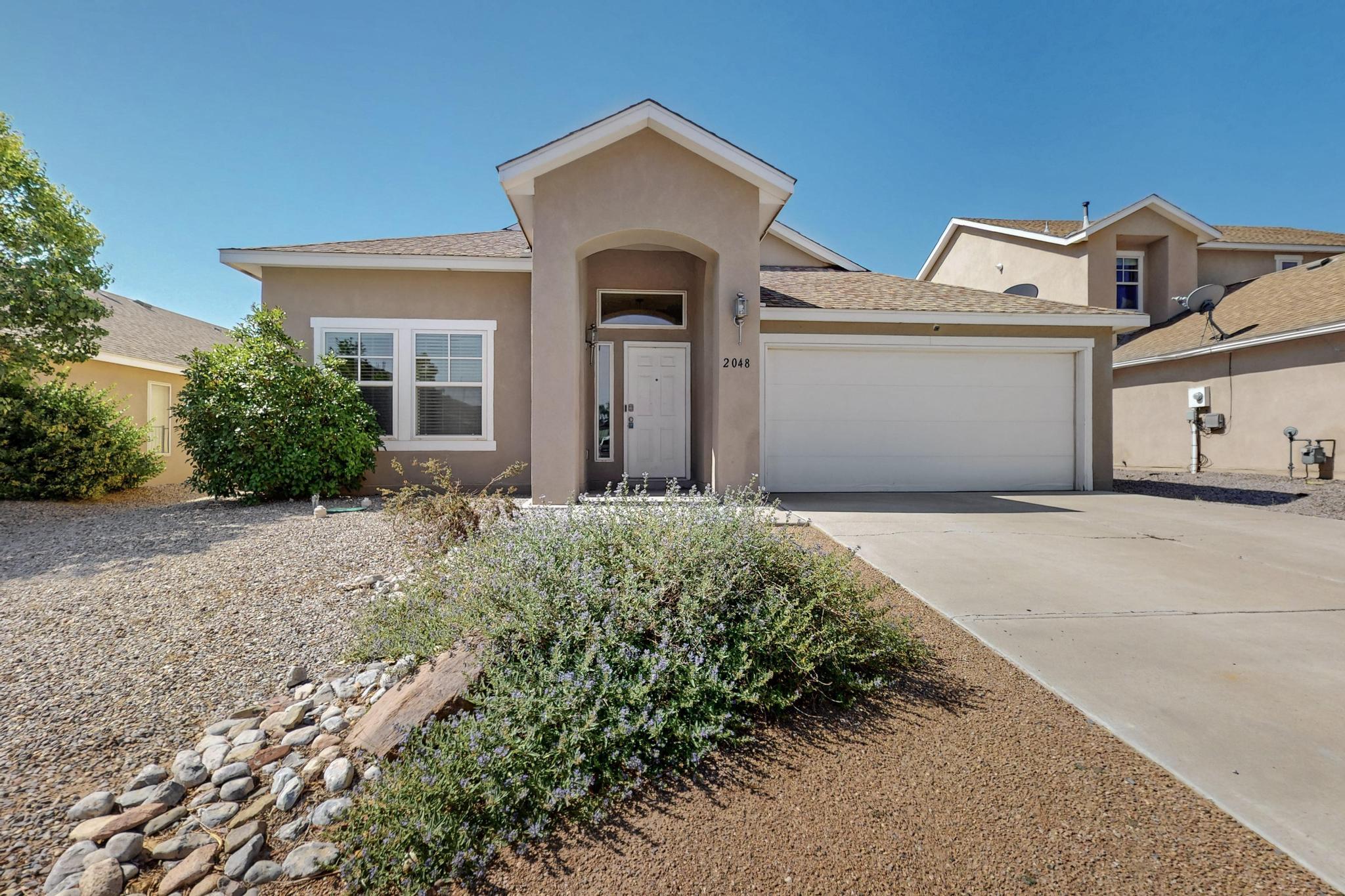 Convenient in Cabezon!! Come & See this Great Home located minutes from all commuter routes originating at Unser/Southern  This well done floor plan features a LR/DR combination & a Family Room open to the Kitchen.  The Home is Loaded with extras like a finished SunSpace,  a Shed & a Large Tiled Patio under a large Gazebo.  The Kitchen is huge & features upgraded cabinets, a closet pantry, an Island and a long raised bartop. Tlled floors grace the Kitchen, Entryway, Laundry & Baths.  The Master Suite area includes updates to the Bath with a Huge Garden Tub & a Separate Shower.  The  Primary Bedroom has an entrance foyer which will easily accommodate any kind of Home Office. Extra shelving for more storage has been installed at the Laundry & Garage.  This home is a keeper! Come & See Today