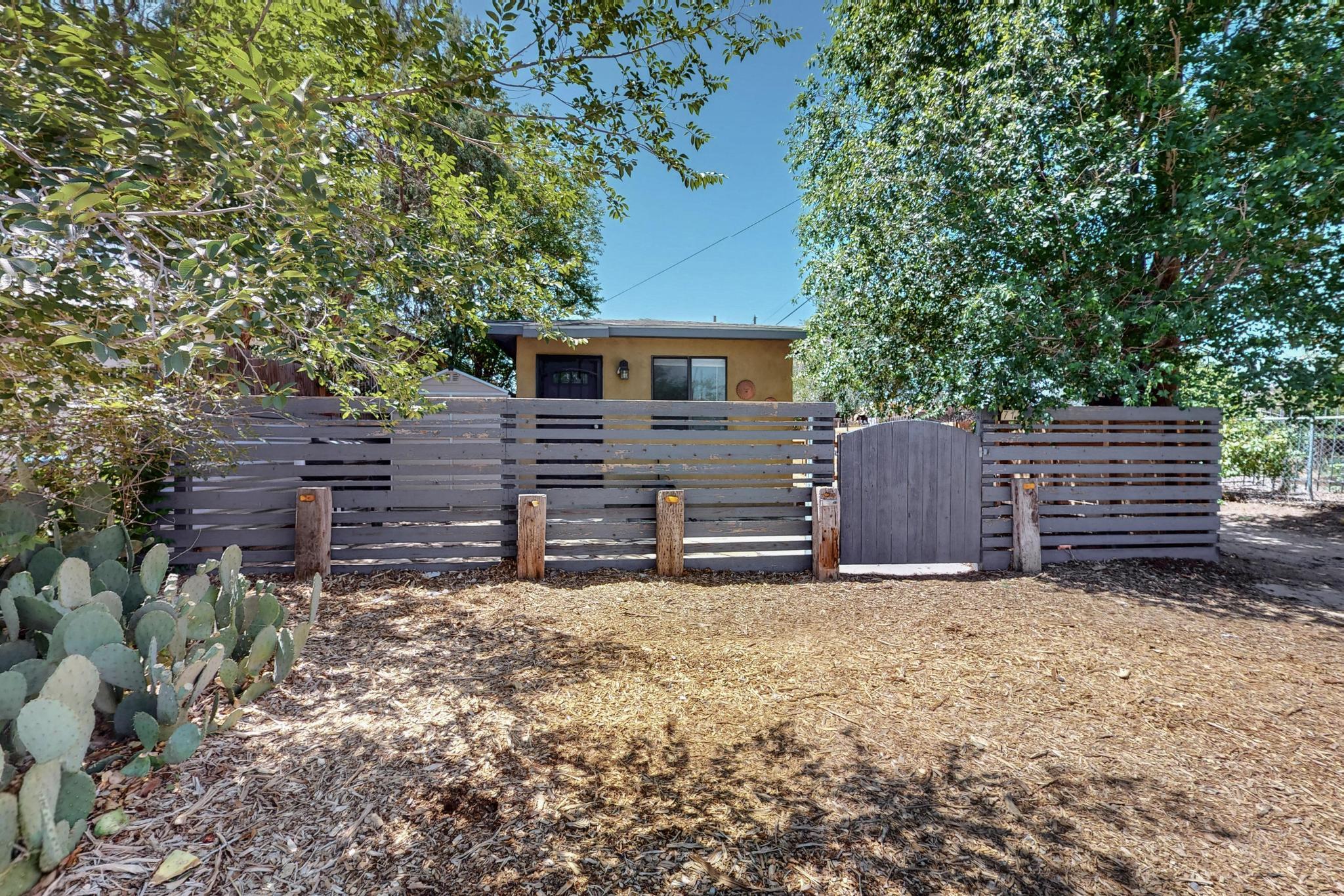Charming and move-in ready, this beautifully updated 2-bedroom, 1-bath home offers comfort, efficiency, and convenience in one inviting package. With 852 square feet of thoughtfully designed living space, the property features recent upgrades including modern appliances, and mini-split systems for year-round comfort. The home sits on a fully fenced lot, providing privacy and security, with the added bonus of extra parking in the back--perfect for guests, recreational vehicles, or additional vehicles. Inside, enjoy a bright and airy atmosphere enhanced by stylish finishes and a functional layout. The spacious kitchen flows easily into the living area. Whether you're a first-time buyer, downsizing, or looking for a great investment opportunity, this home checks all the boxes.